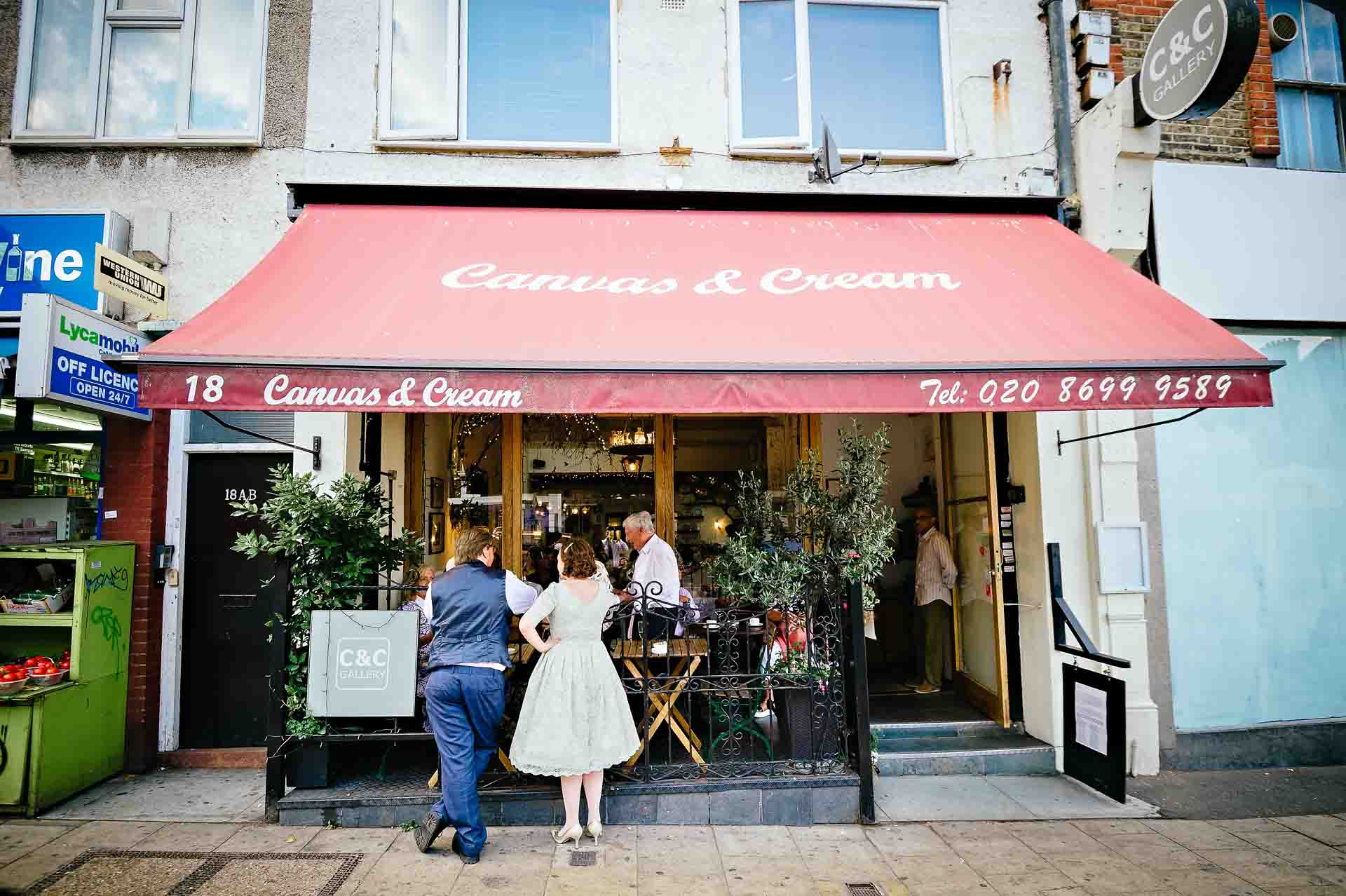Bride with father standing outside Canvas and Cream Wedding Venue in London