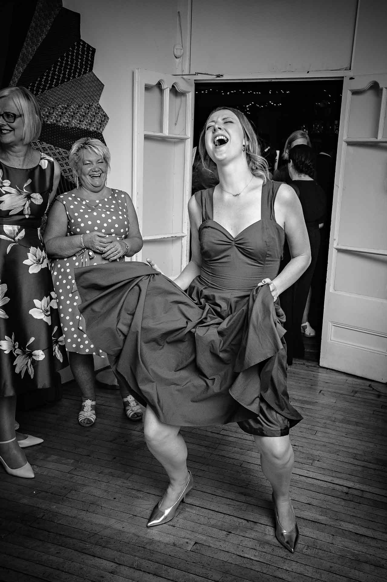 Bridesmaid dancing - lost in the moment