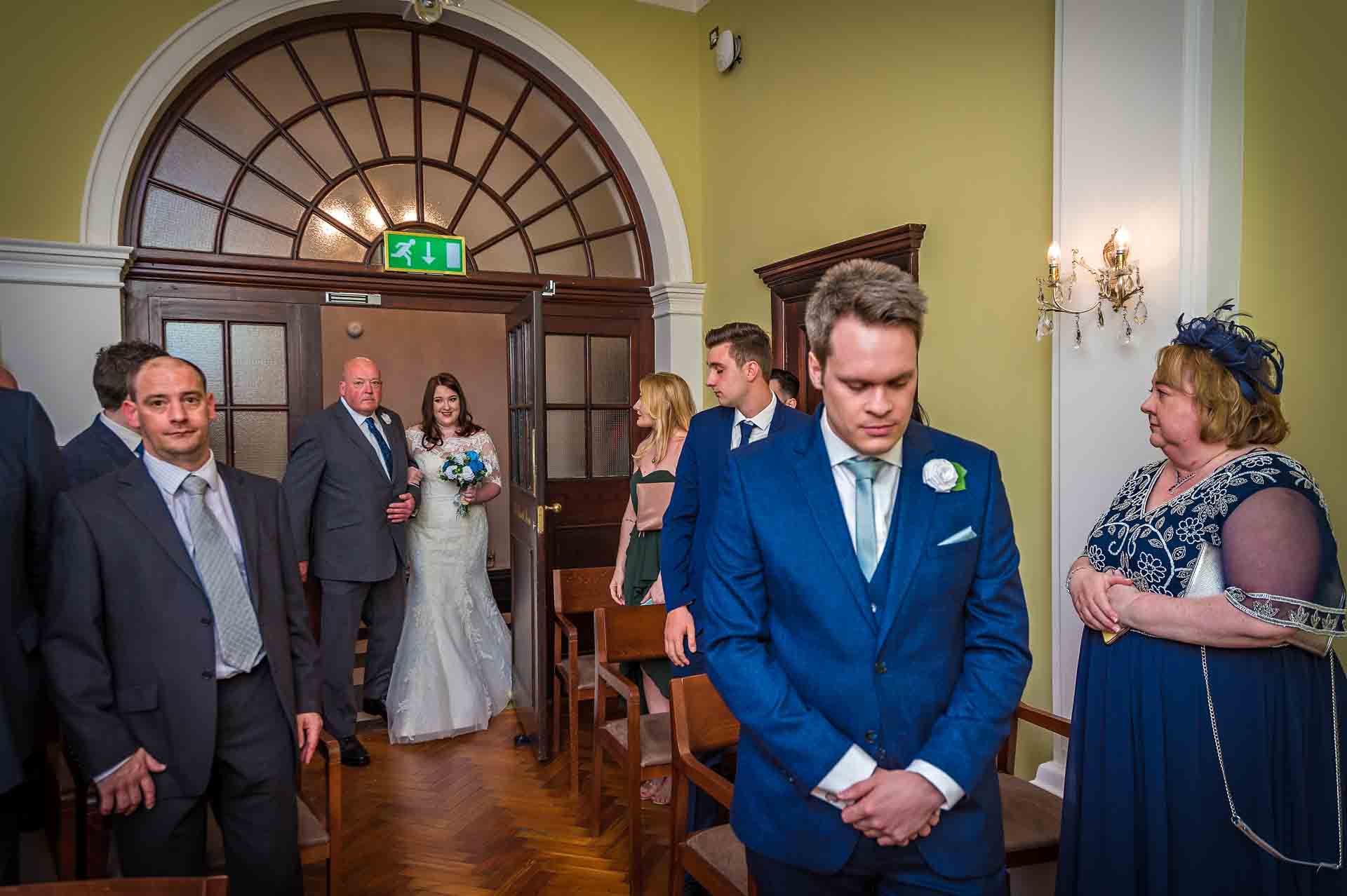 Groom Waiting Nervously in Rossetti Room, Chelsea as Bride Enters with Father