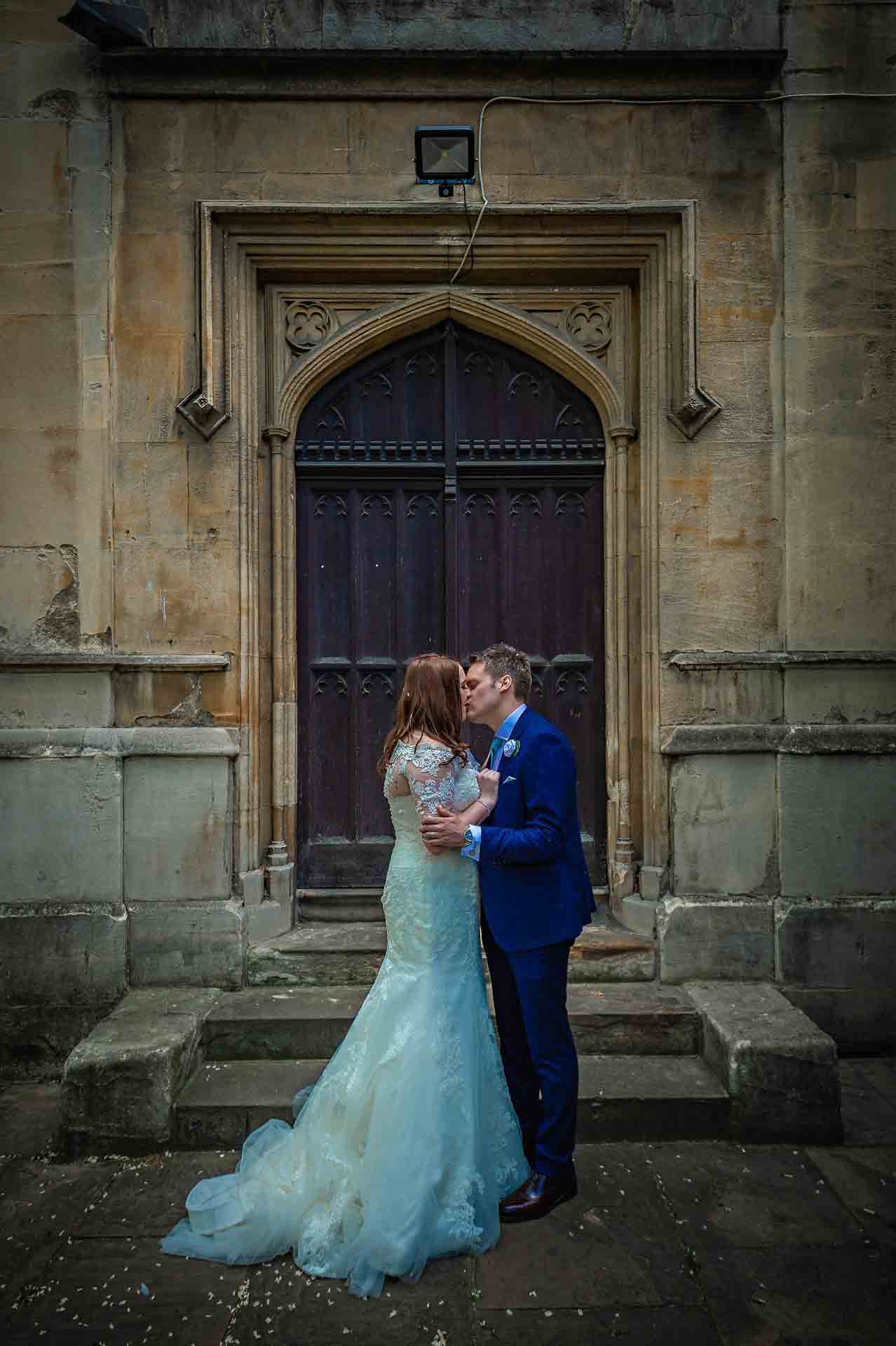 Wedding Couple Kissing Portrait Outside St Luke's Church Chelsea