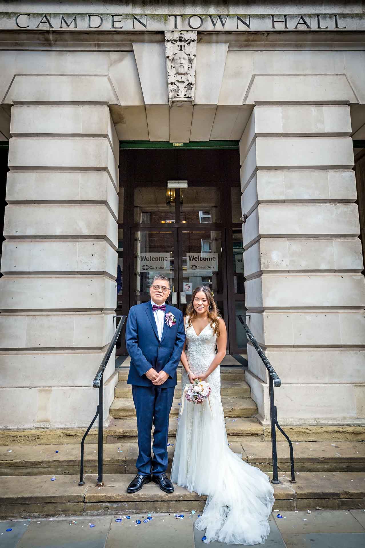 Portrait of Bride with Father on Steps Outside Camden Town Hall in London