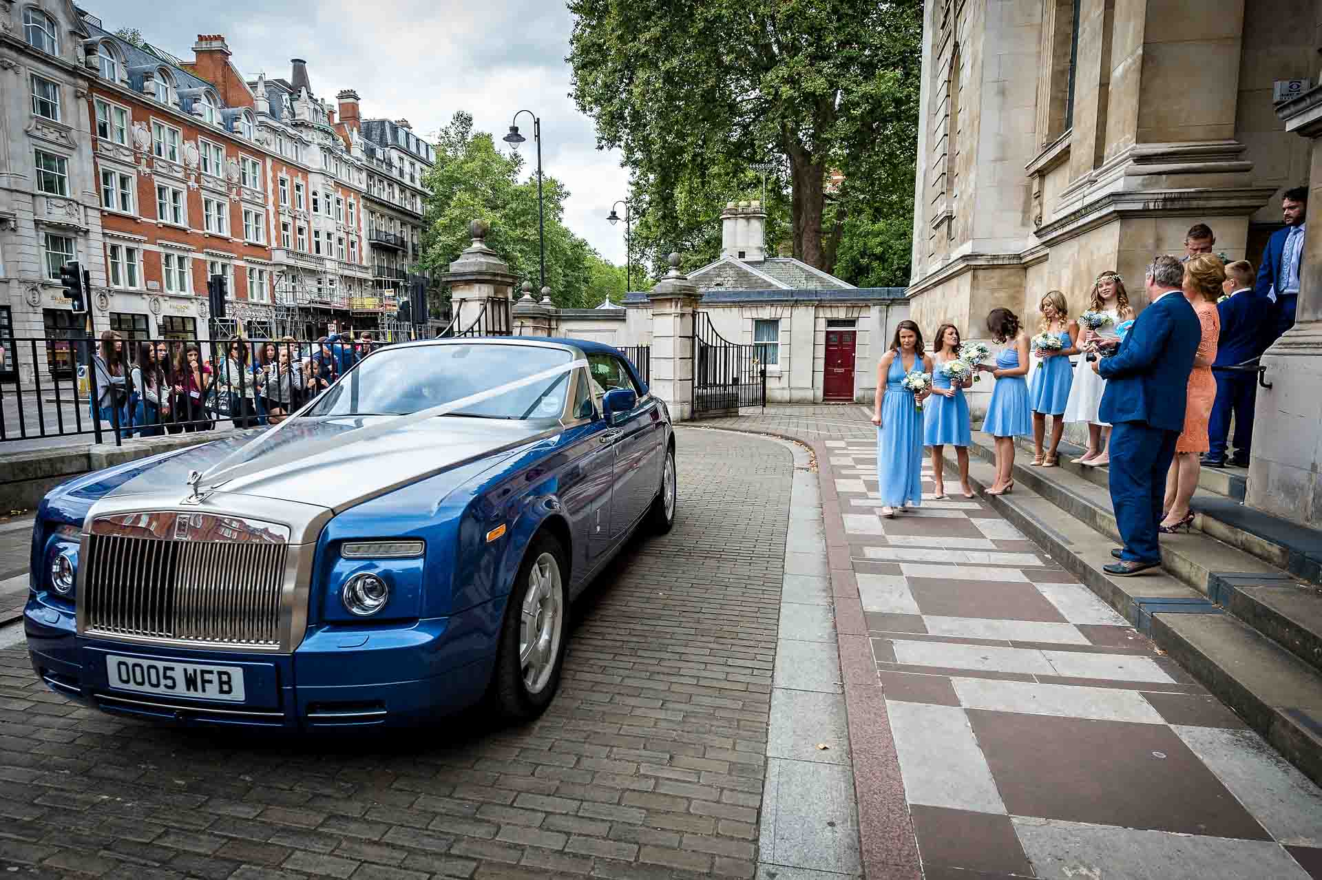 Blue and silver Rolls Royce outside Brompton Oratory for wedding