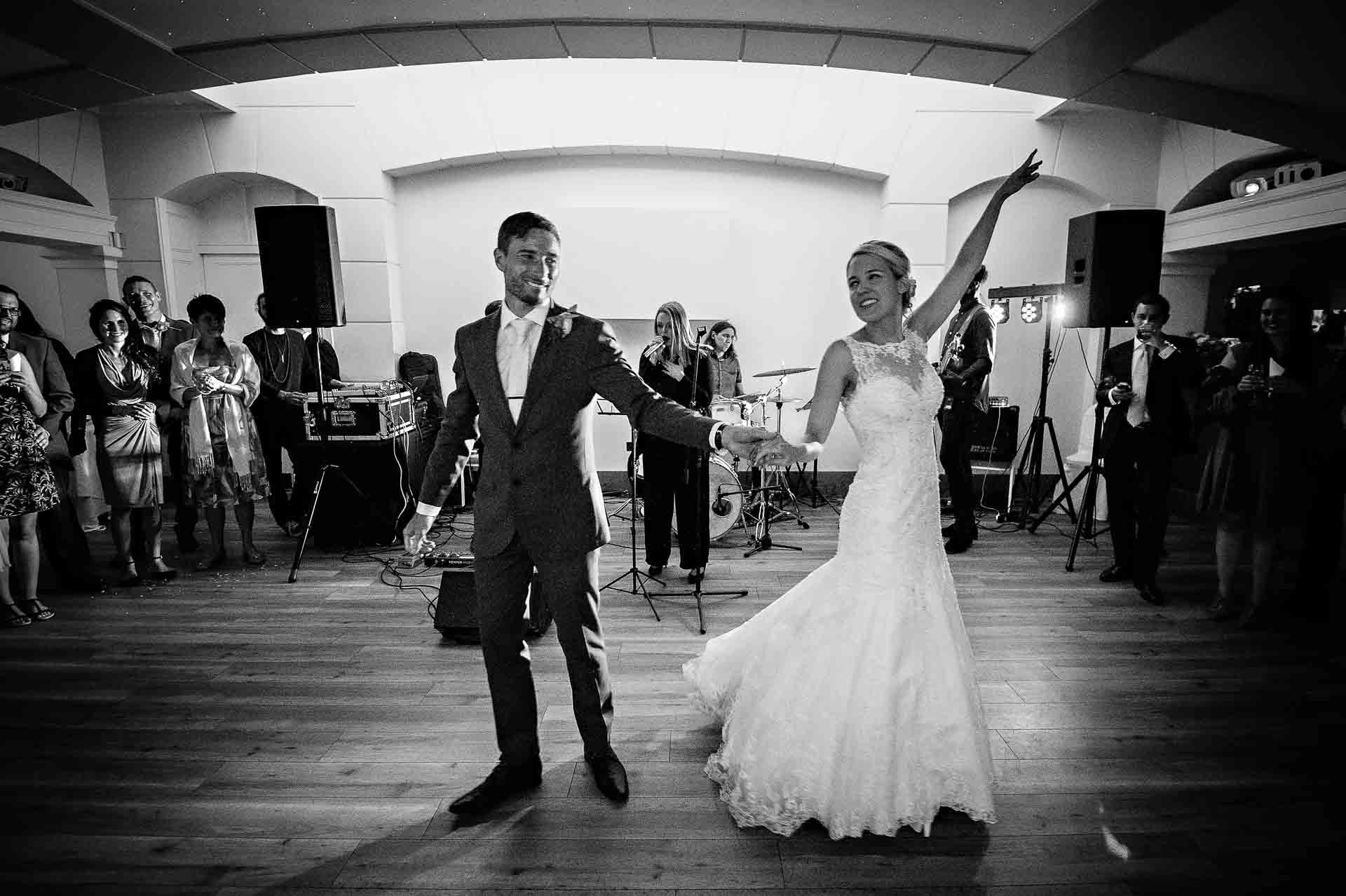 Bride and groom about to give first dance at wedding in London