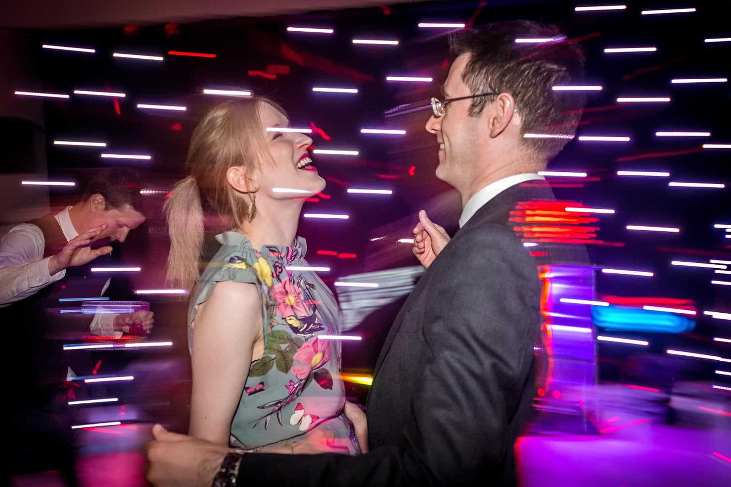 Lighting effects shot of couple dancing at wedding