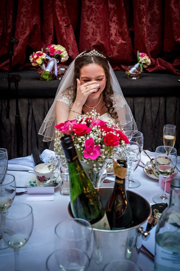 Bride Looking Embarrassed During Wedding Speeches in Cardiff