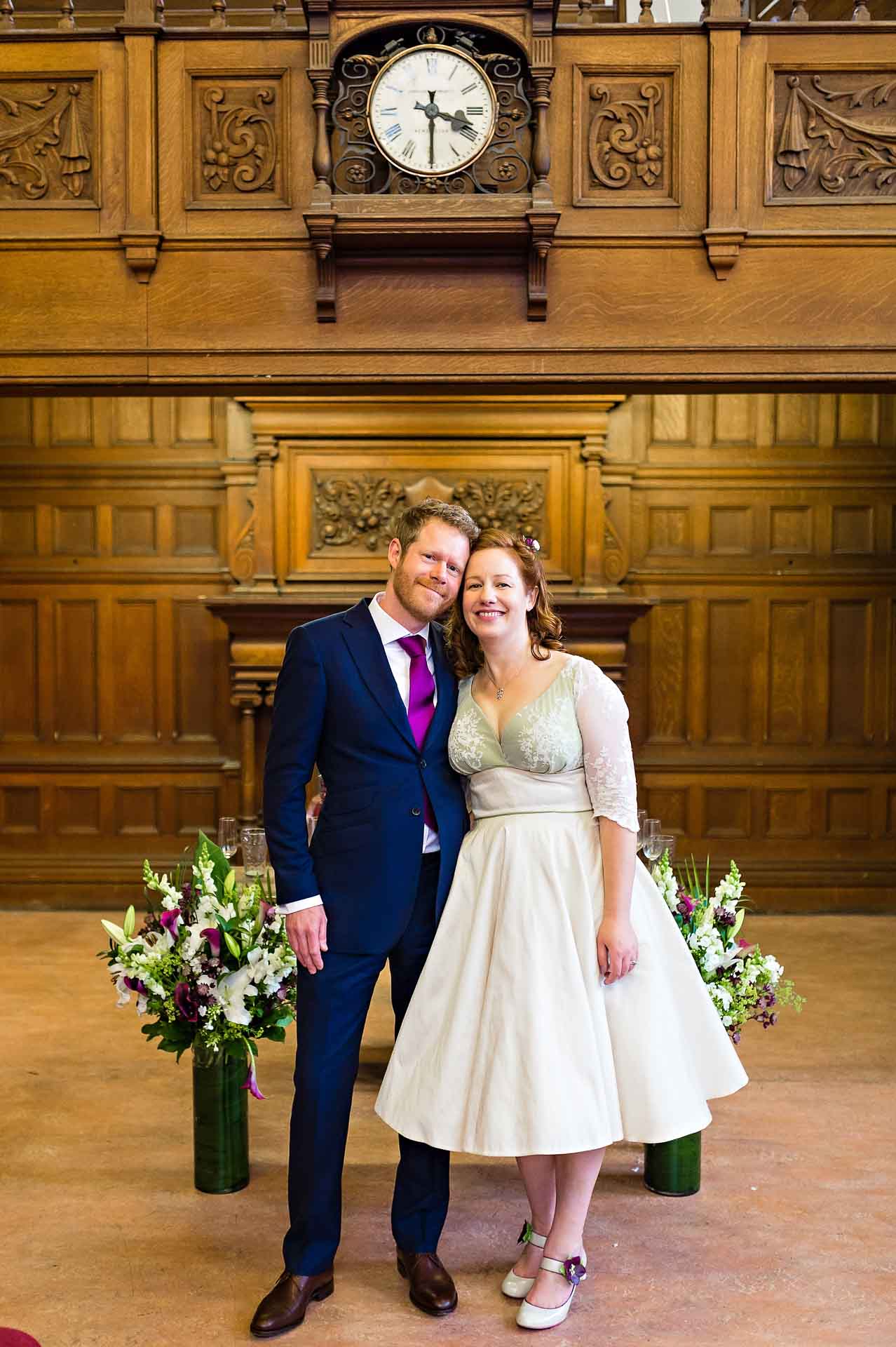 Portrait of Bride and Groom with Clock at Chiswick Town Hall