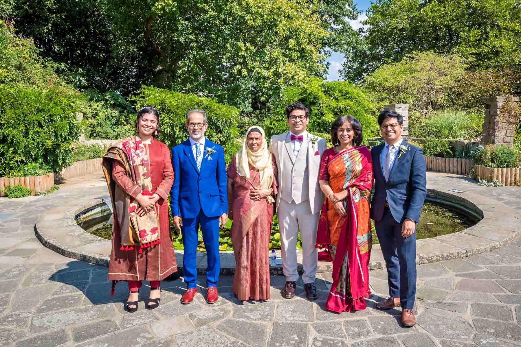 Indian family wedding photo in the sunshine at Danson Park