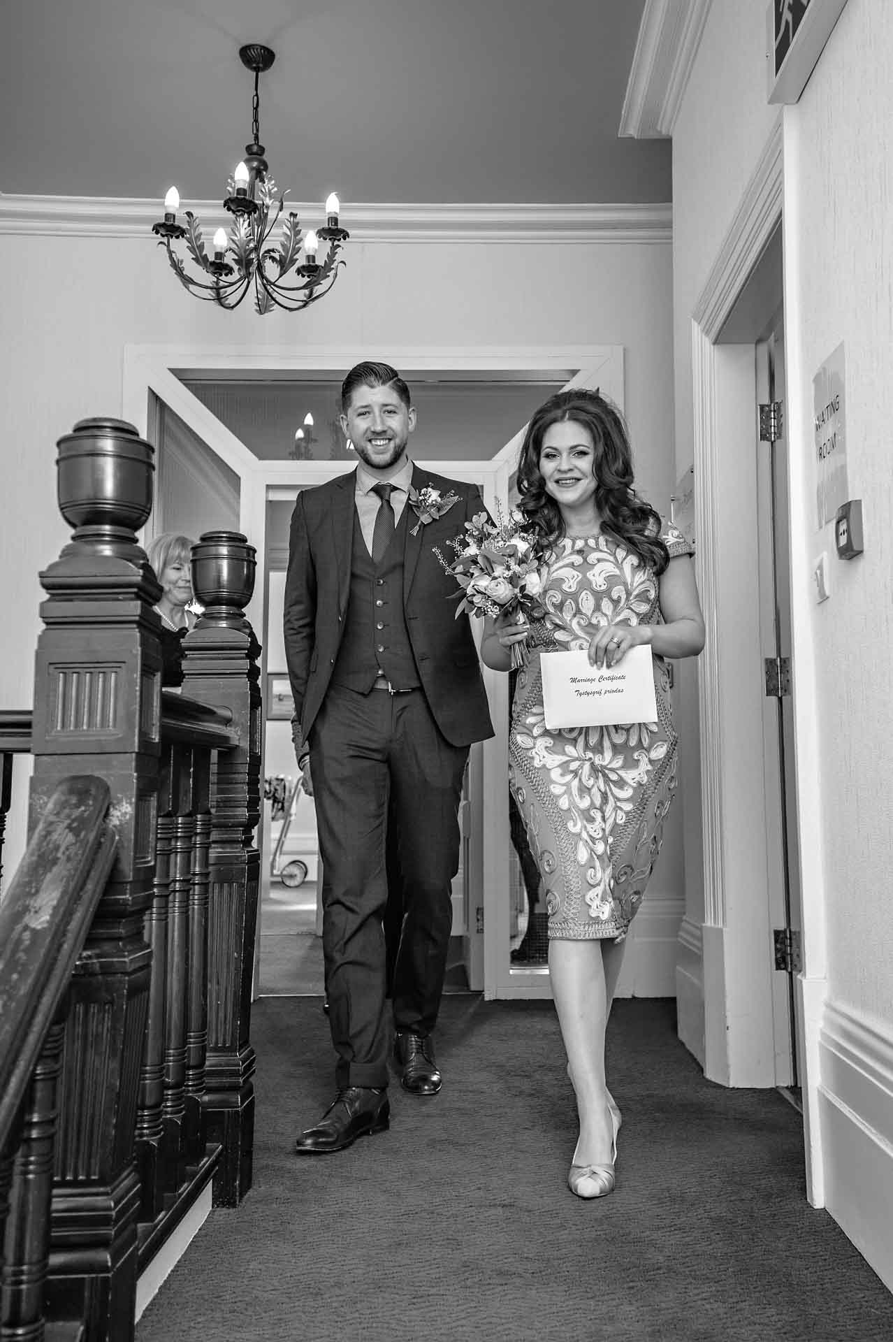 Wedding Couple Leaving Register Office After Their Wedding at Mansion House Newport