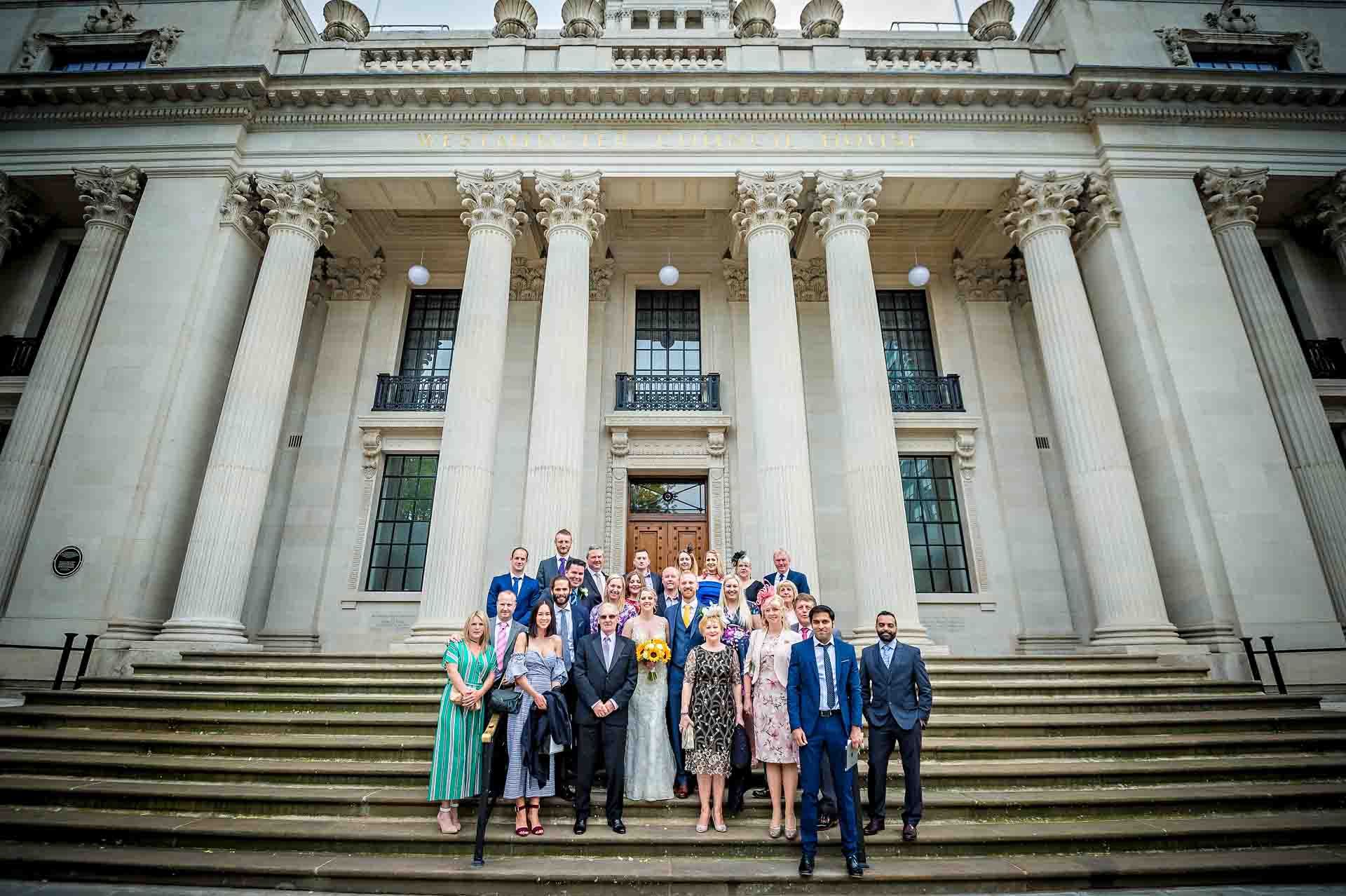 Group Wedding Photograph Outside Old Marylebone Town Hall