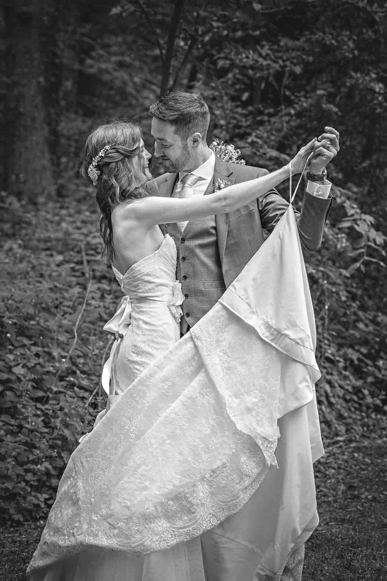Bridal Couple Dancing in Woods