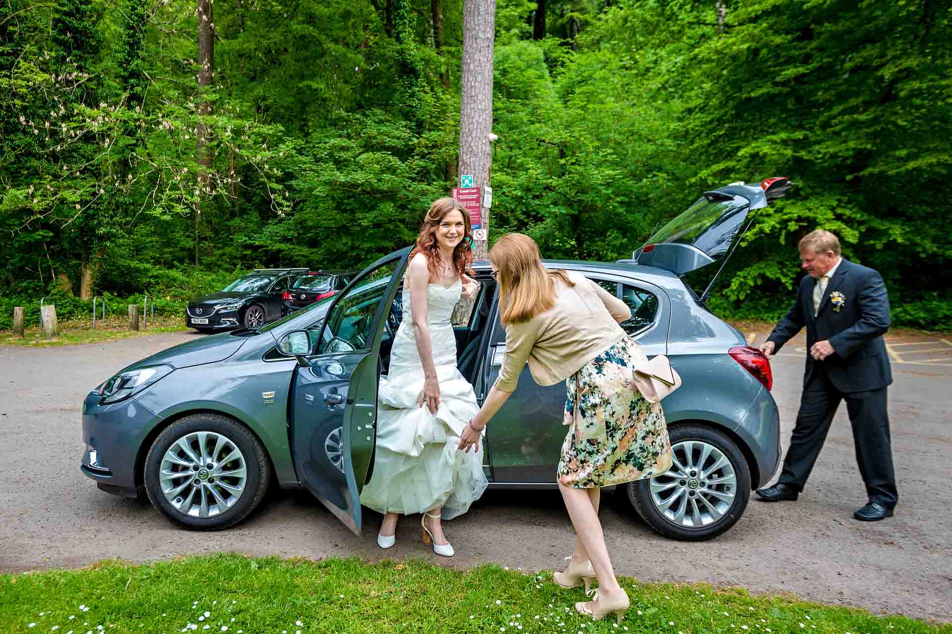 Bride's Arrival at Castell Coch, Cardiff in grey hatchback