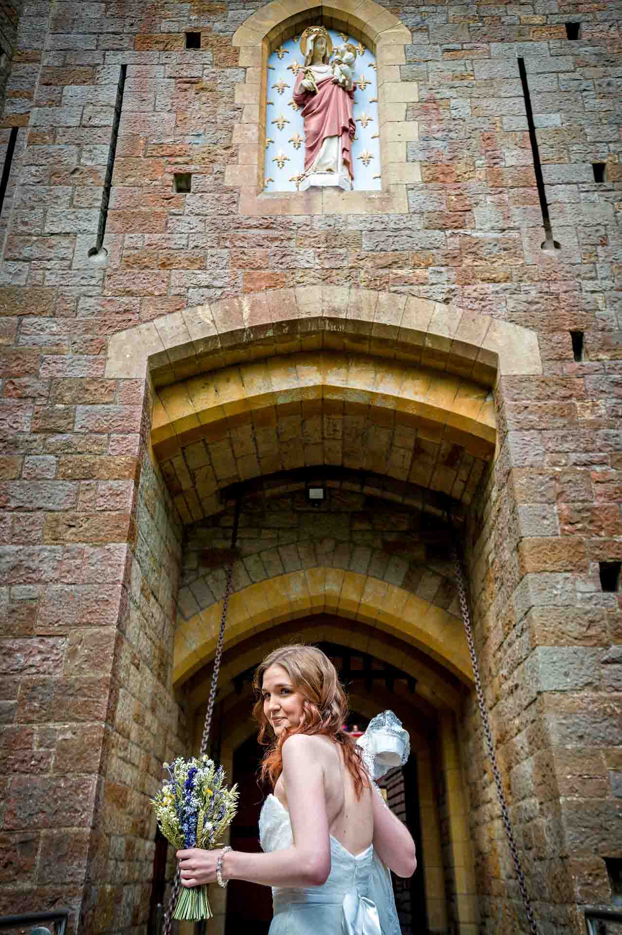 Castell Coch Wedding Portrait of Bride at Entrance Looking Over Shoulder