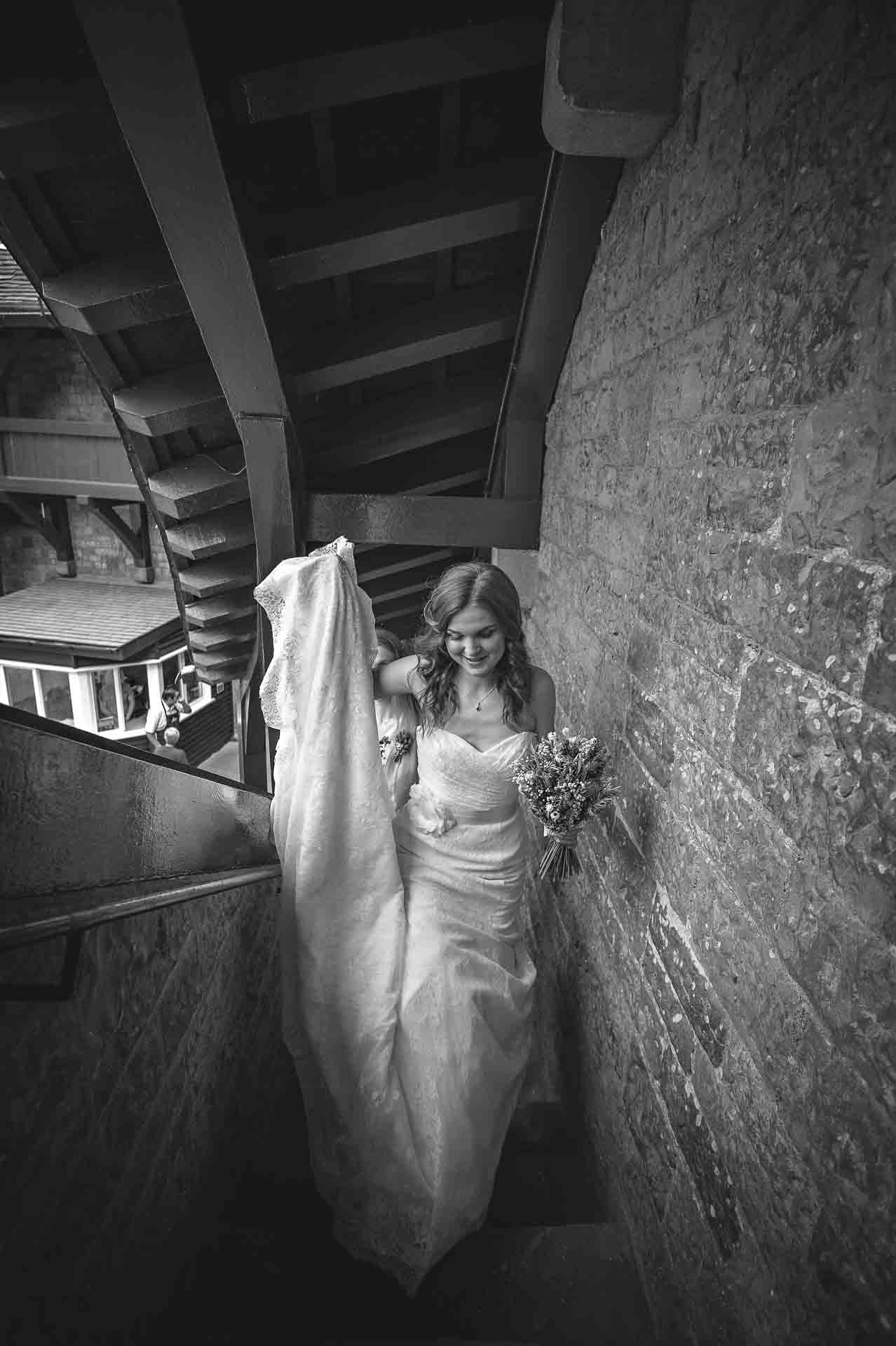Castell Coch Wedding Photograph of bride climbing steps to ceremony