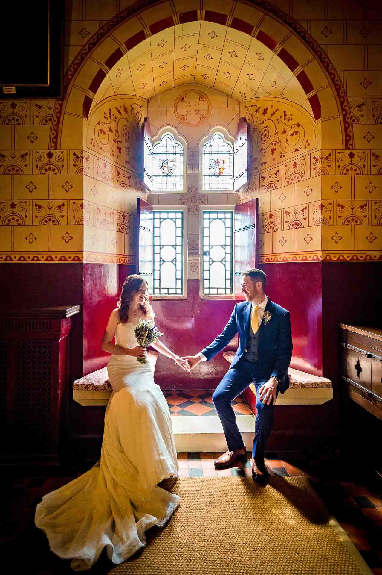 Wedding Portrait of Couple Holding Hands in Banqueting Hall of Castell Coch