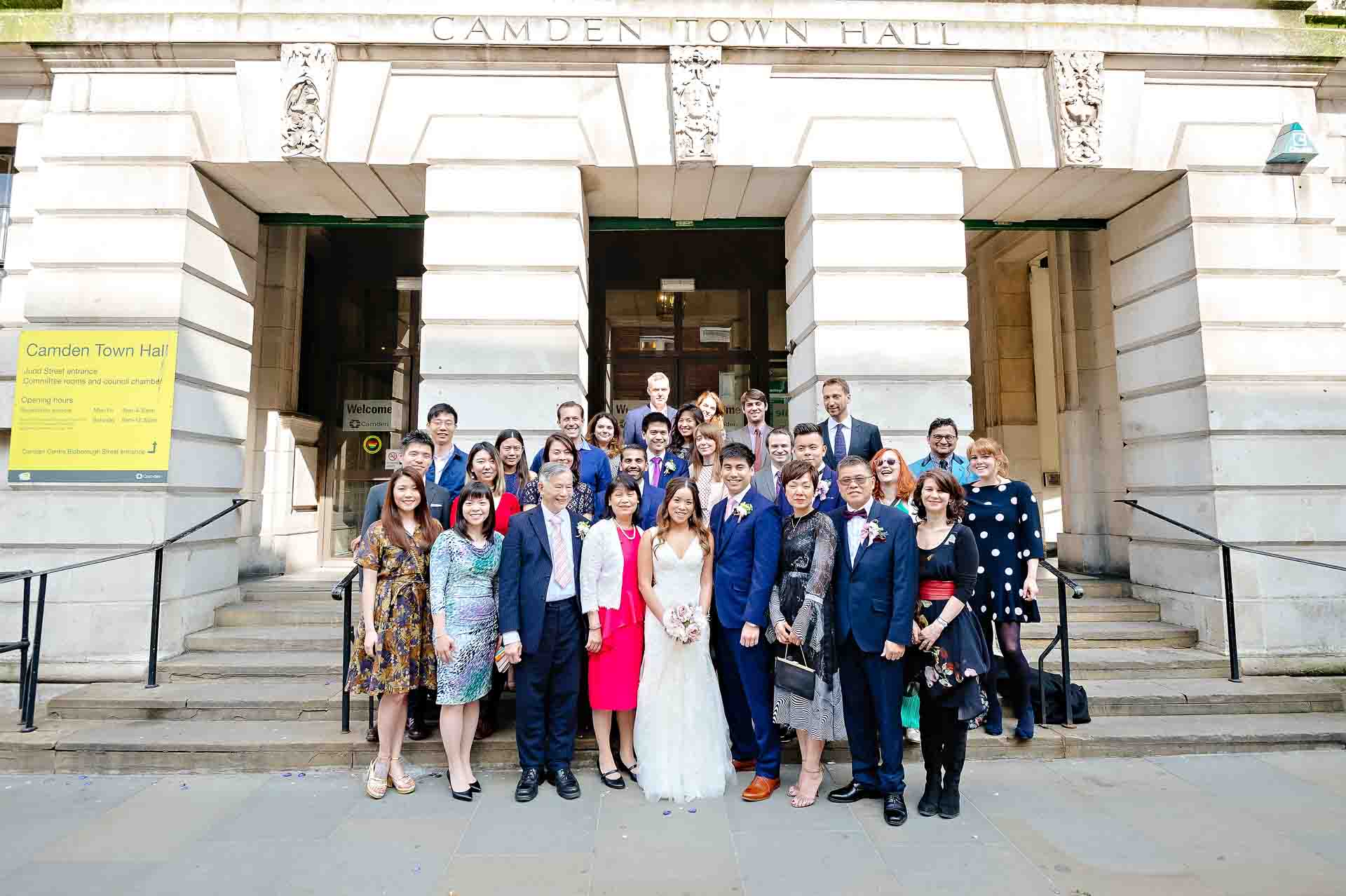Wedding party outside Camden Town Hall