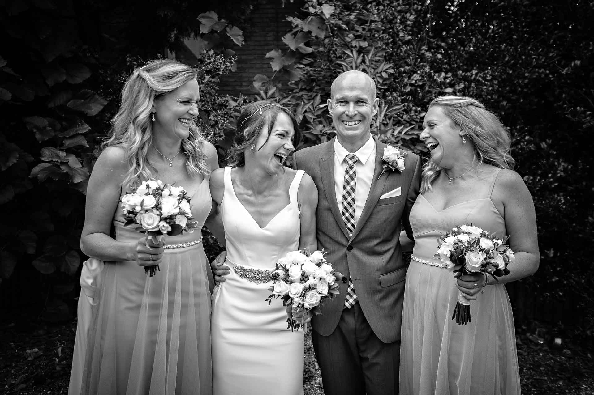 Fun Portrait of Married Couple with Bridesmaids at Wedding in Newport, Wales