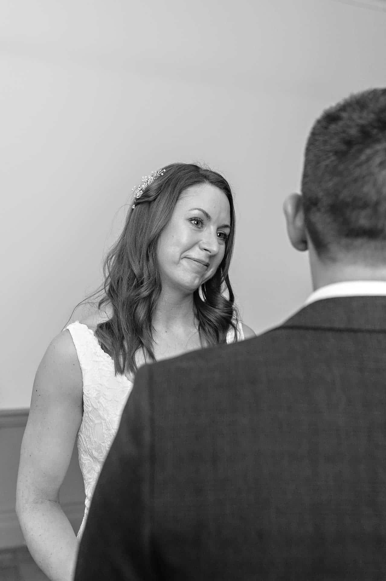 Bride gazing lovingly at her groom