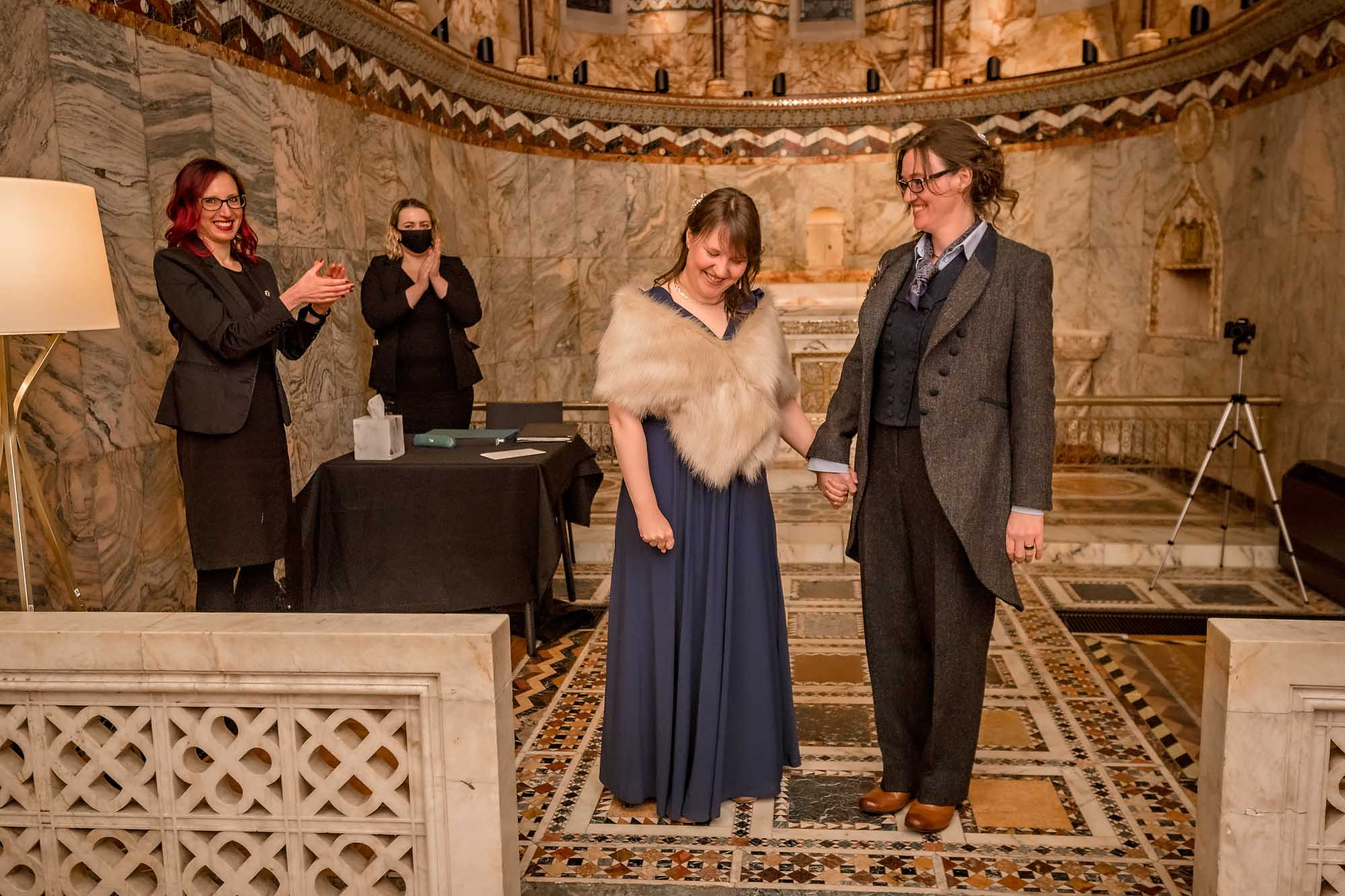 The Westminster registrars clap a female gay couple at their Fitzrovia Chapel wedding