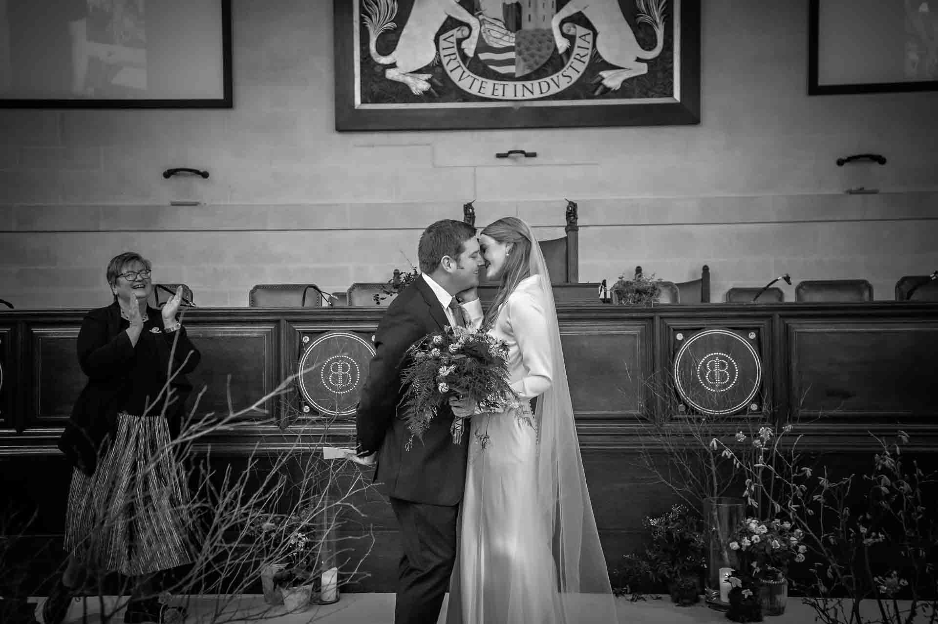 The couple have their first kiss at wedding in Council Chamber Bristol City Hall