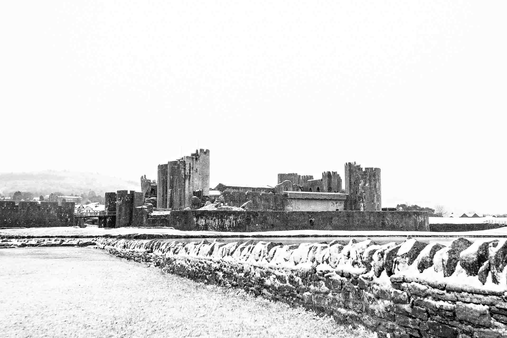 Caerphilly Castle Photographed From the North side with Stone Wall in the Snow
