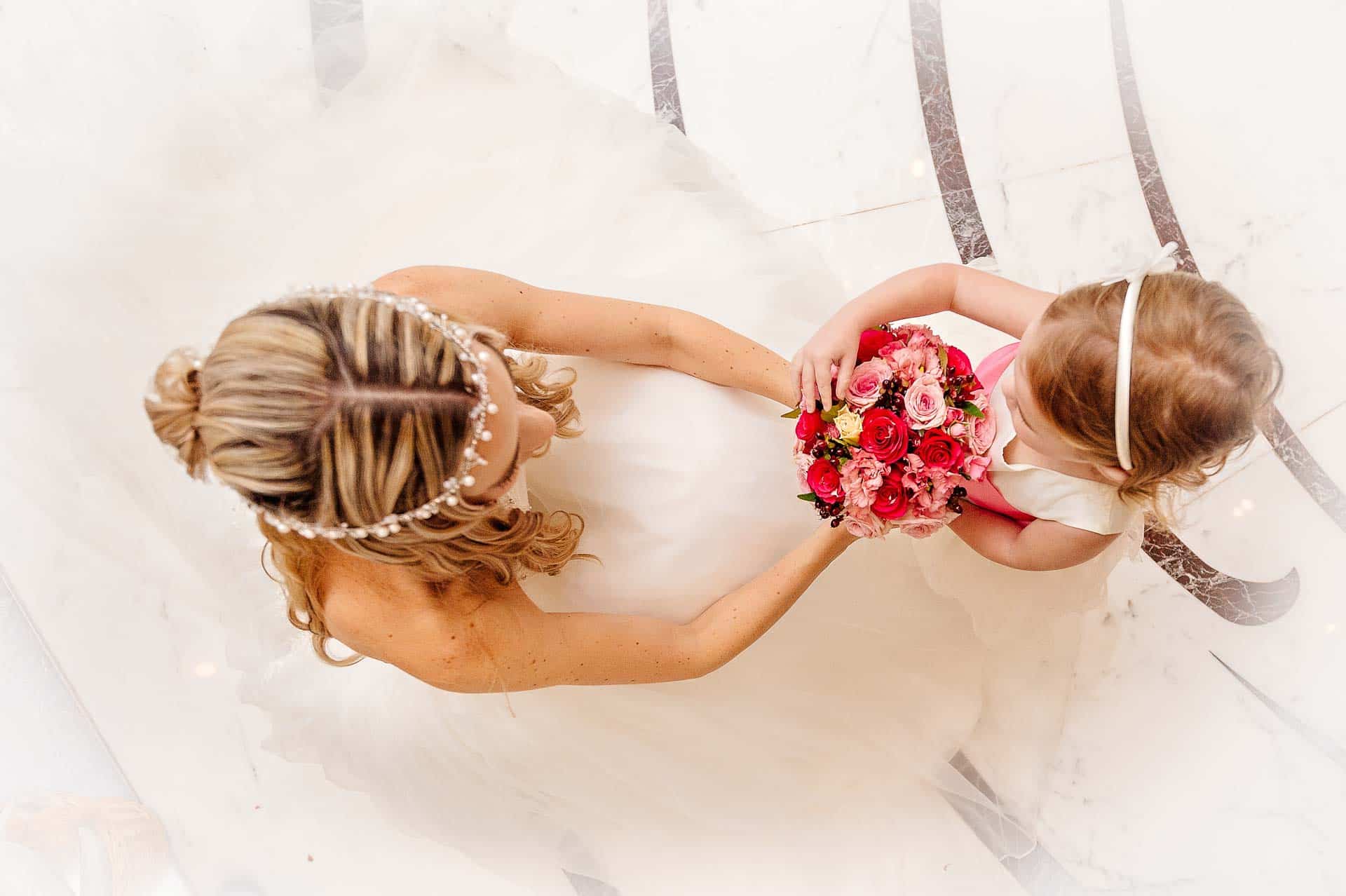 Bride with Bridesmaid and Bouquet at Caerphilly Wedding