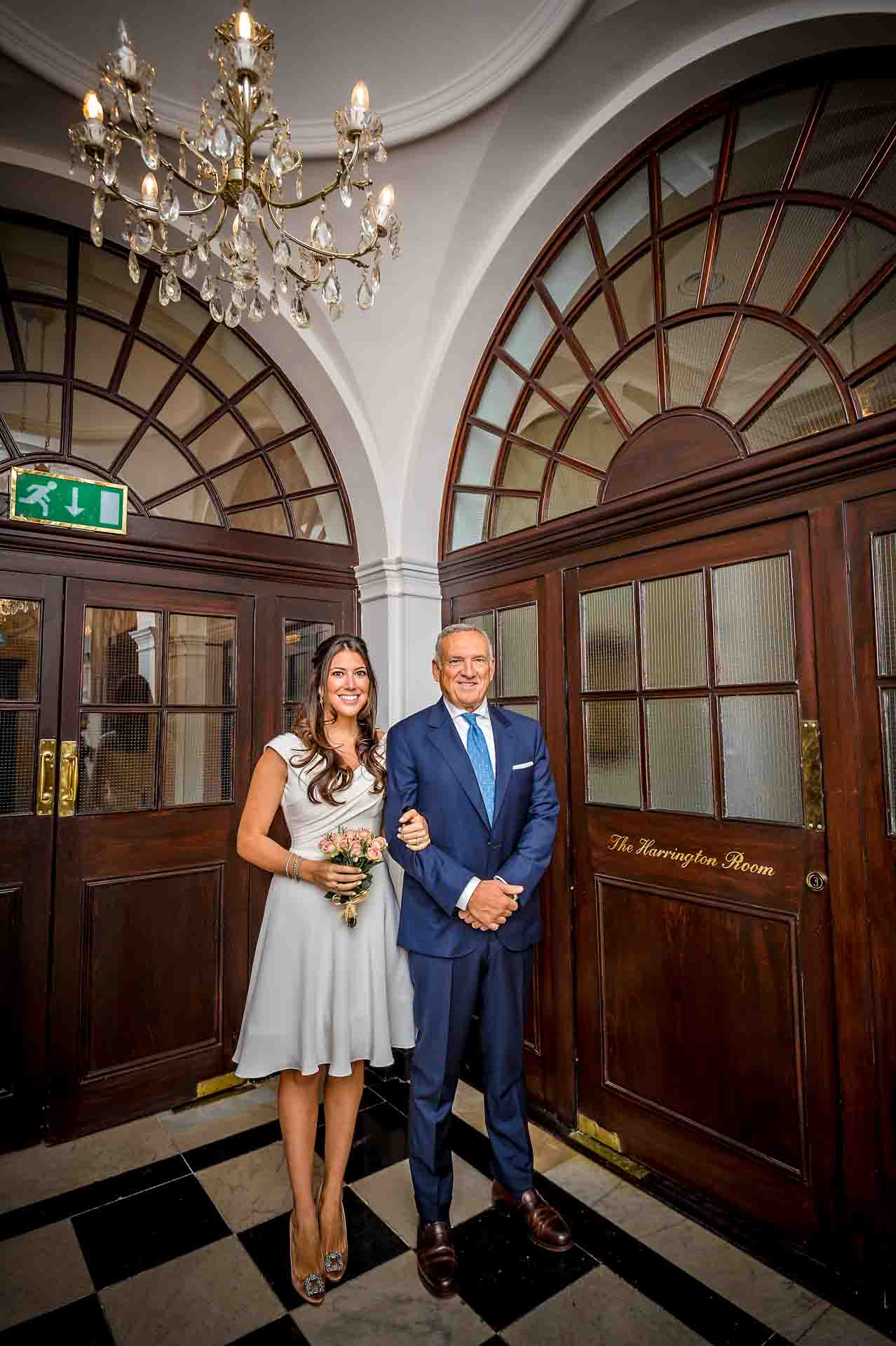 Bride with father Wait for Ceremony to Start in Hall of Chelsea Register Office