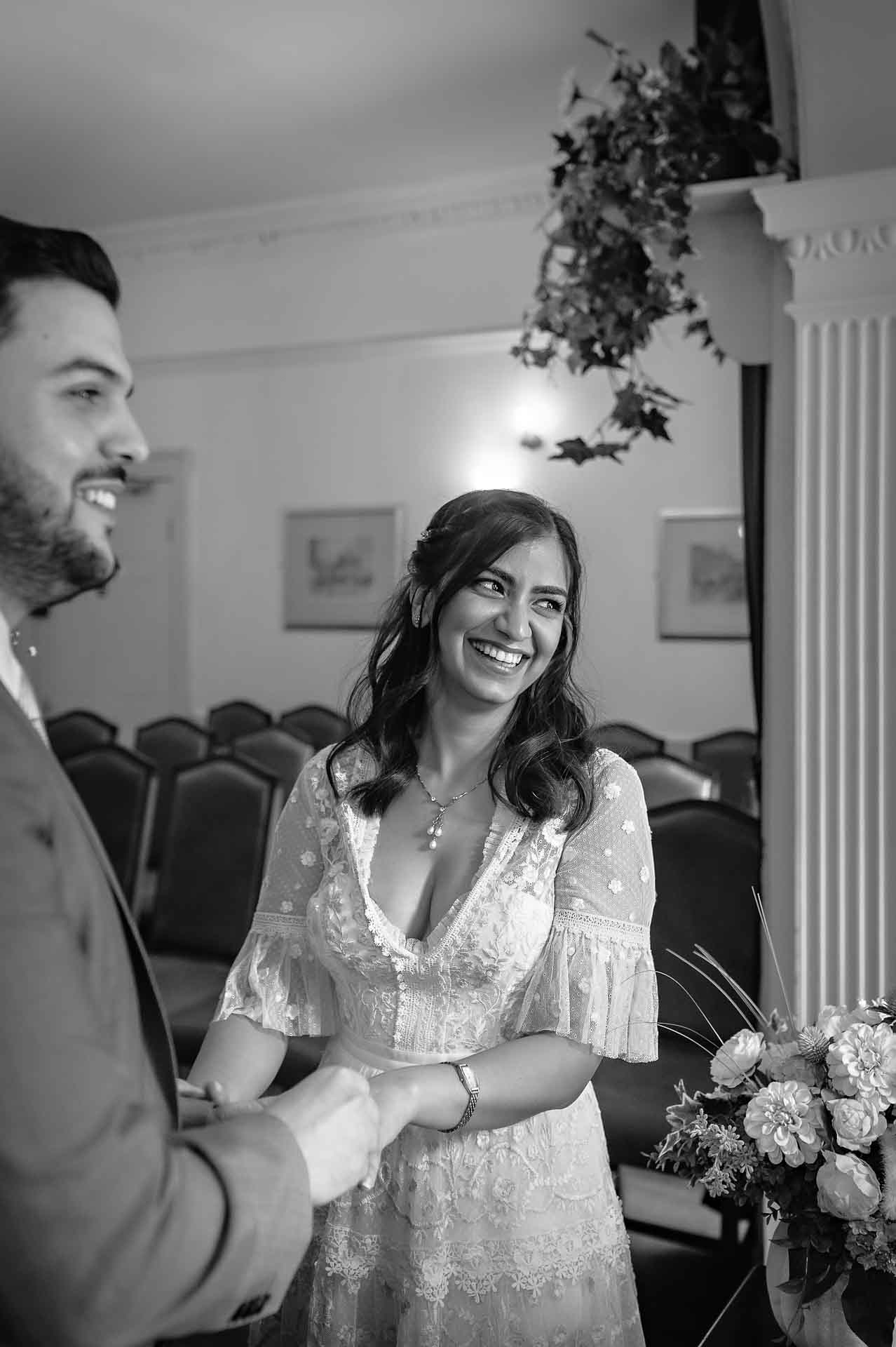 Bride laughing in Garden Room at Southwark