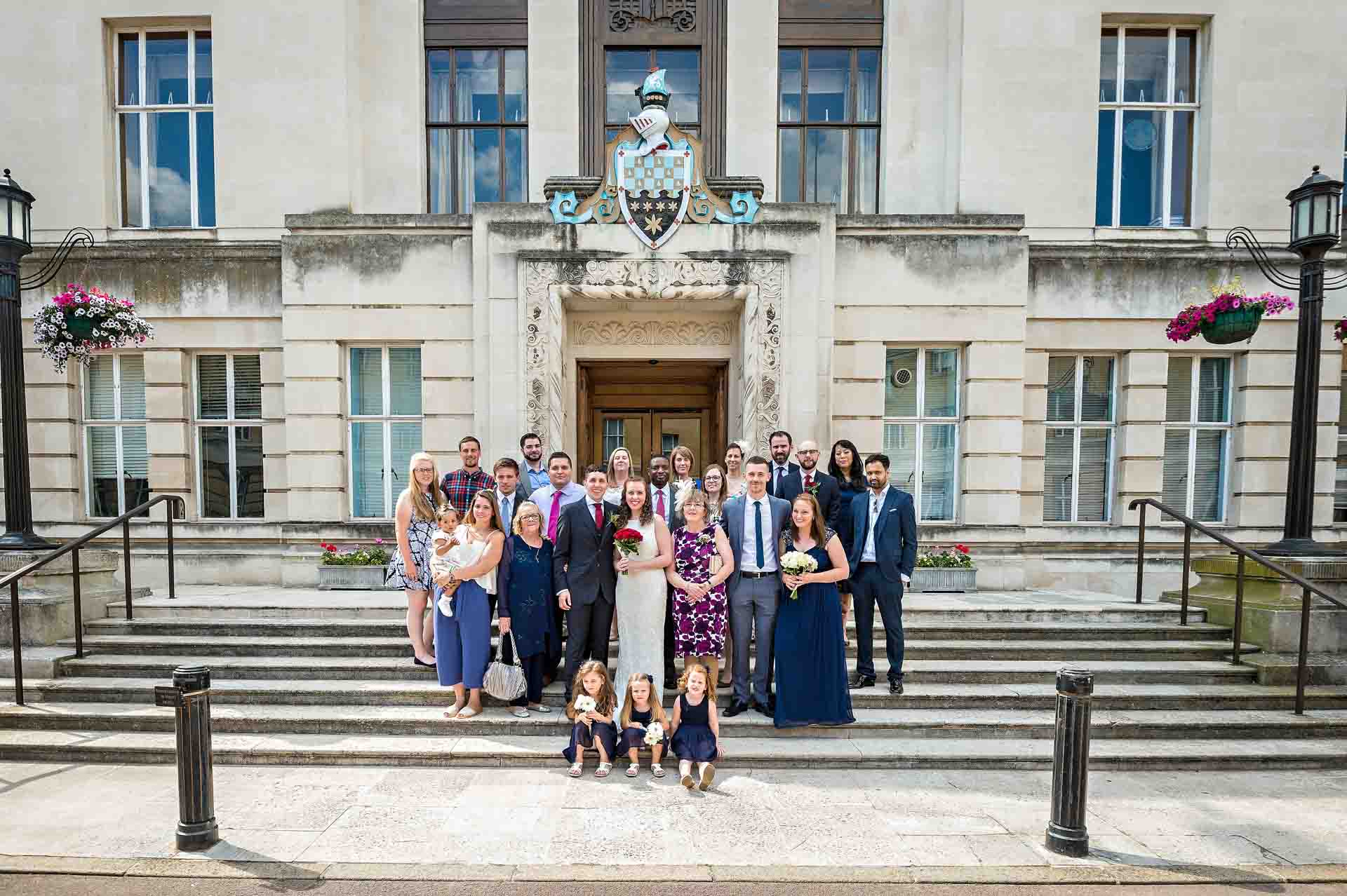 Group photo of the whole wedding party at Wandsworth Town Hall