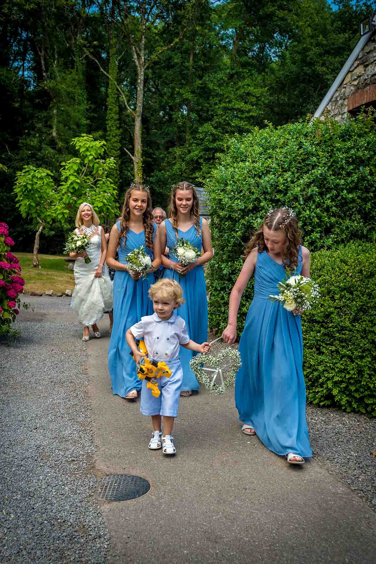 Pecoed House Wedding - Bridesmaids and Pageboy with Bride Following