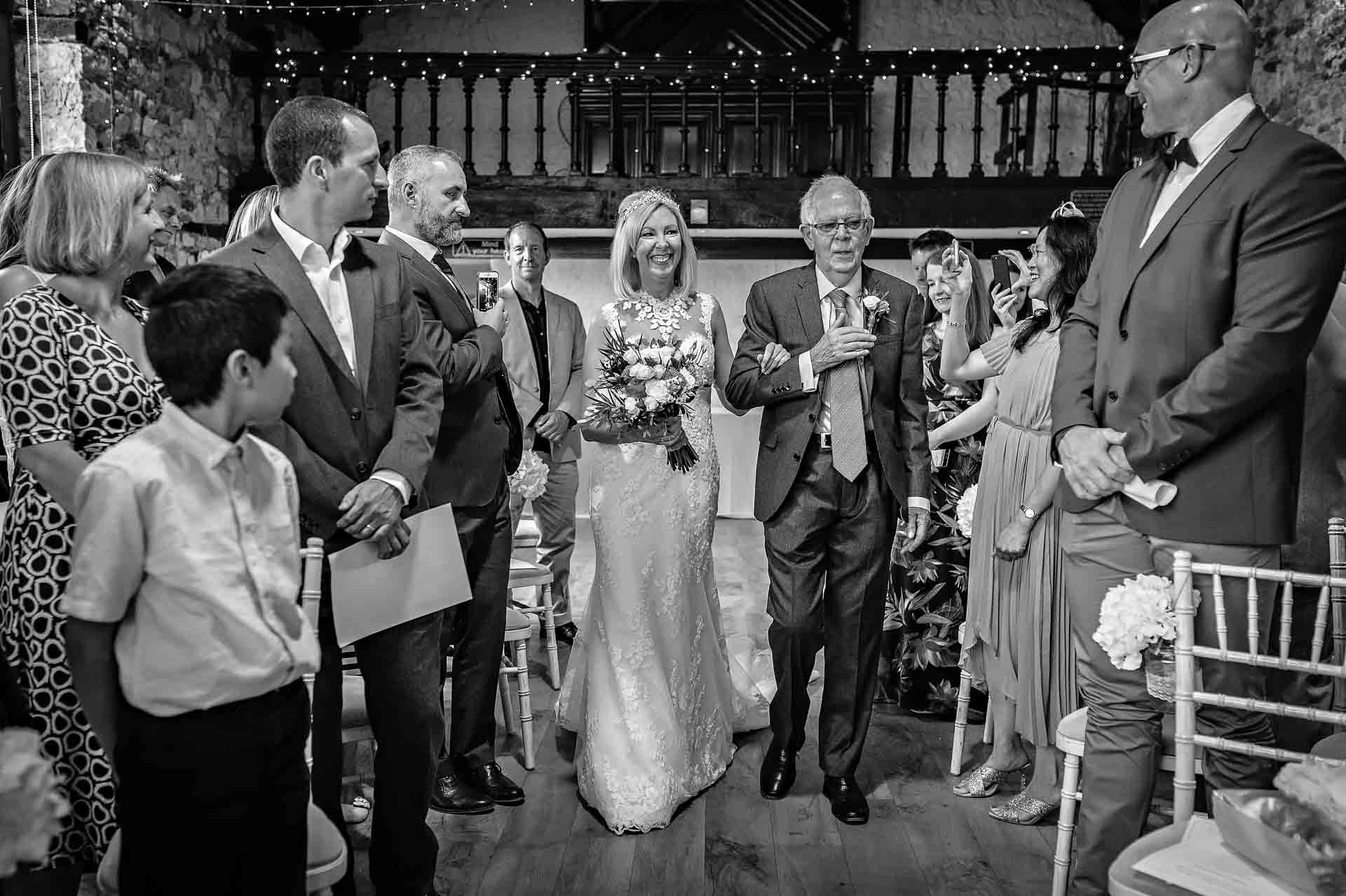 Bride and Father Walking Down Aisle at Pencoed House Wedding