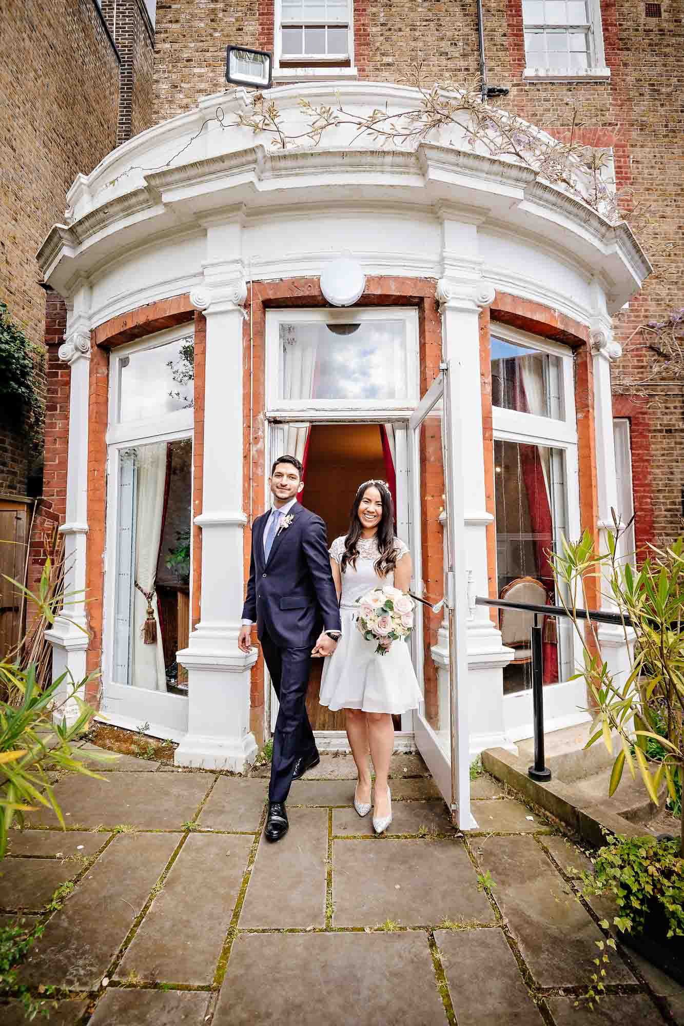The couple leave Southwark's Garden Room through the French windows and enter the garden