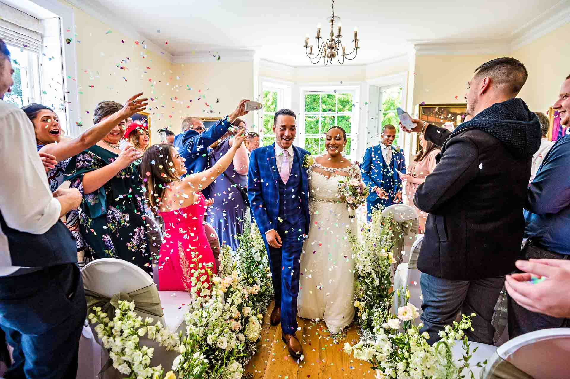 Couple Just Married at Merton Park House Wedding Confetti at Pembroke Lodge