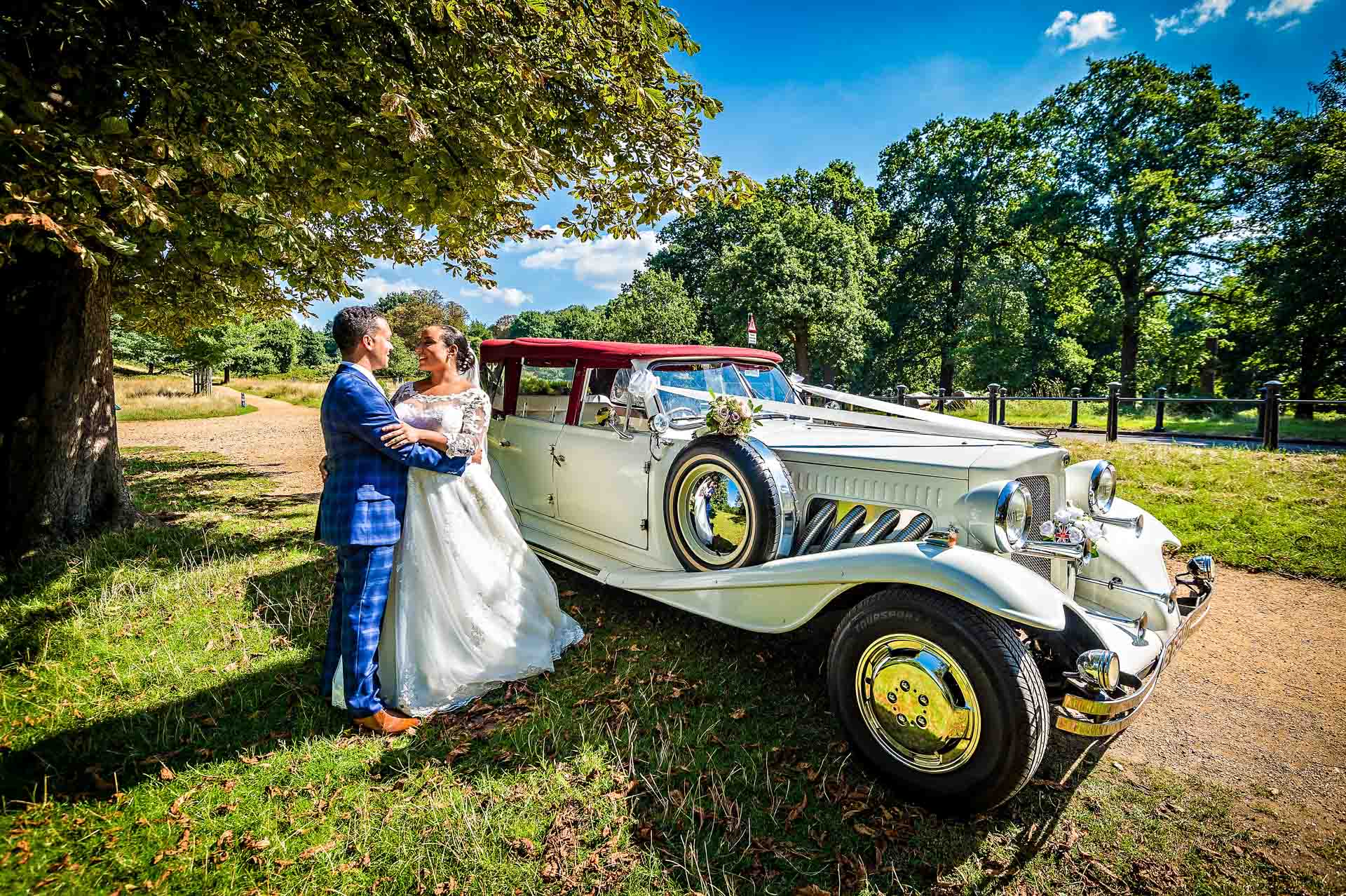 Wedding Couple Portrait by Vintage Car