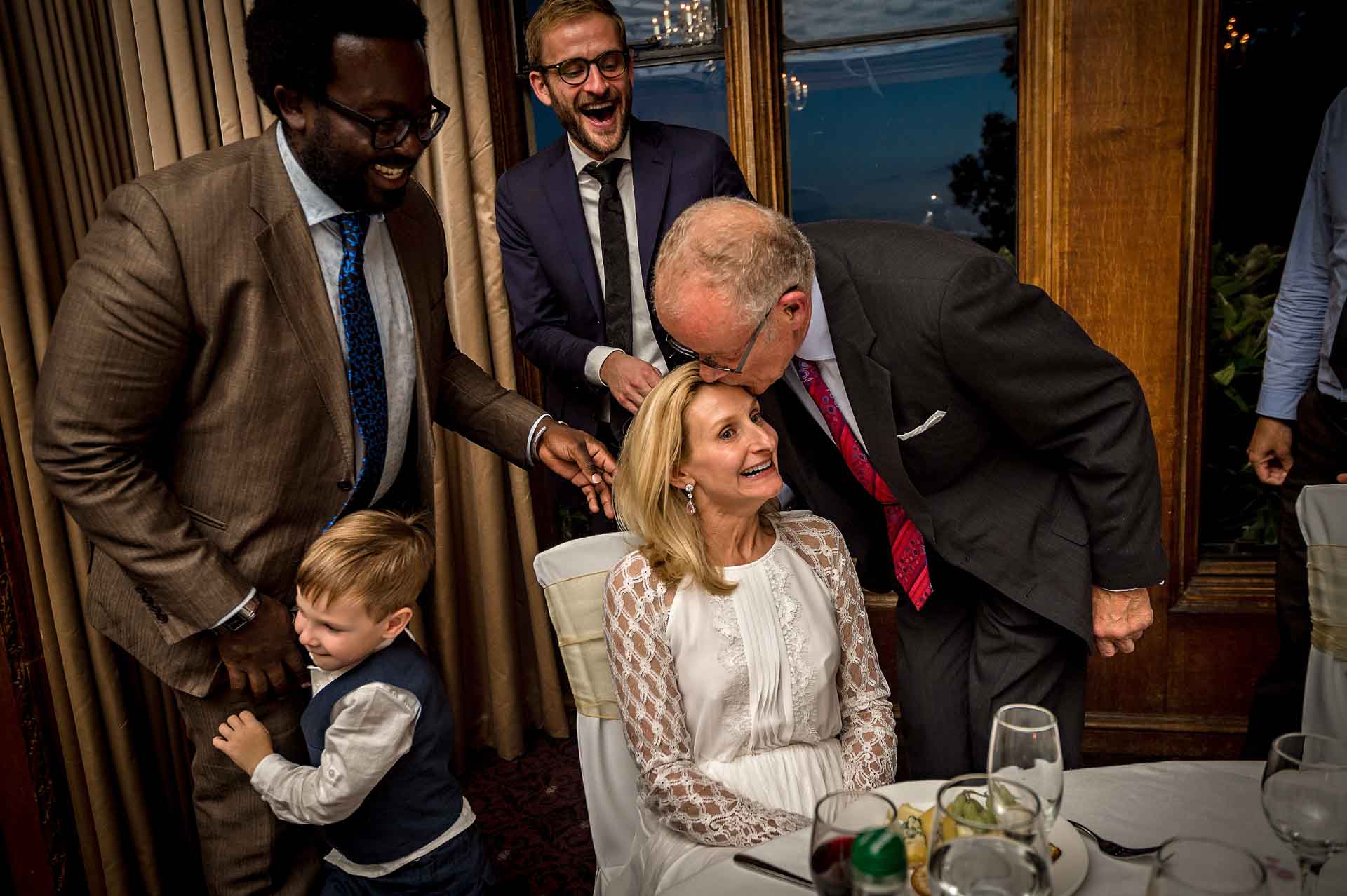 Bride's father kisses the bride at Danish wedding in London