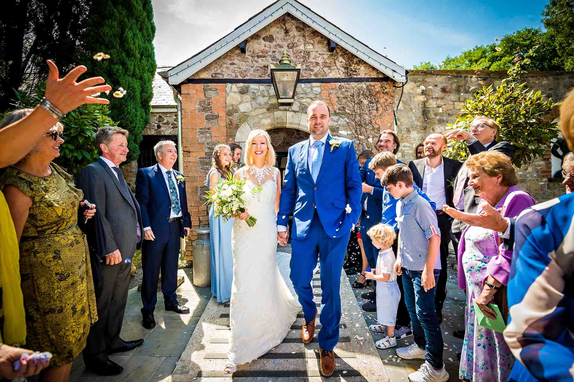 Confetti Throwing as Couple Leave the Old Barn