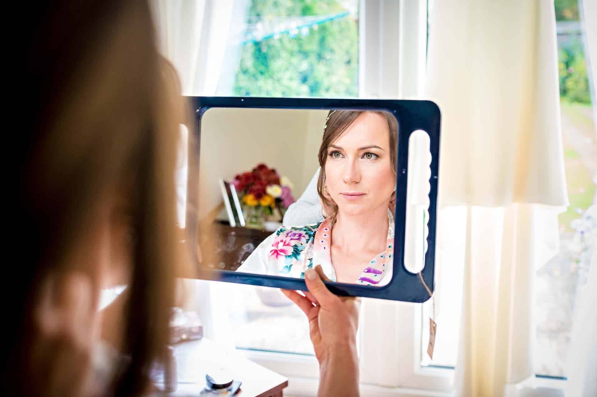 Bridal Preparations at Wedding - Bride Holding Mirror in Cardiff