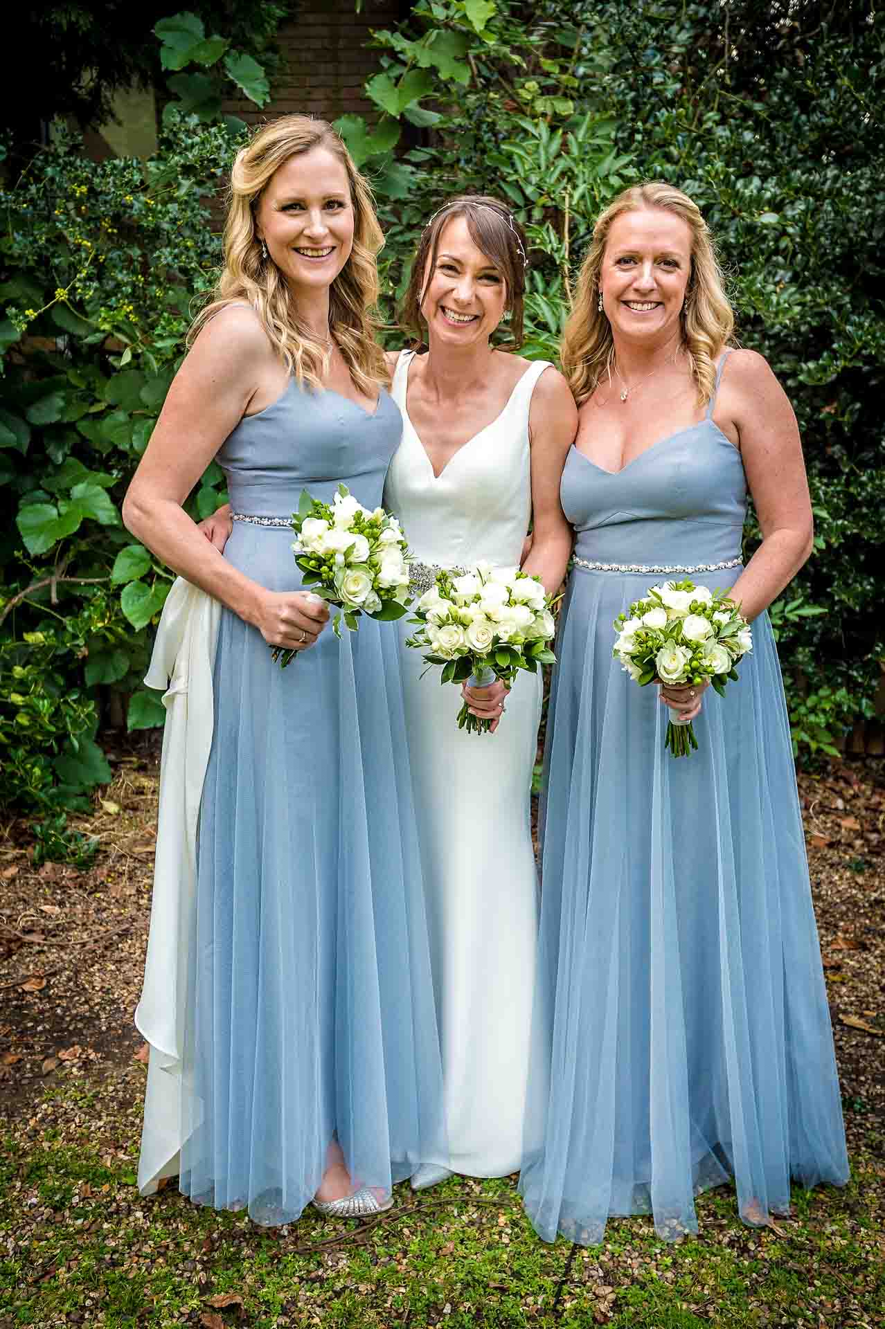 Formal Portrait of Bride with Friends at Wedding