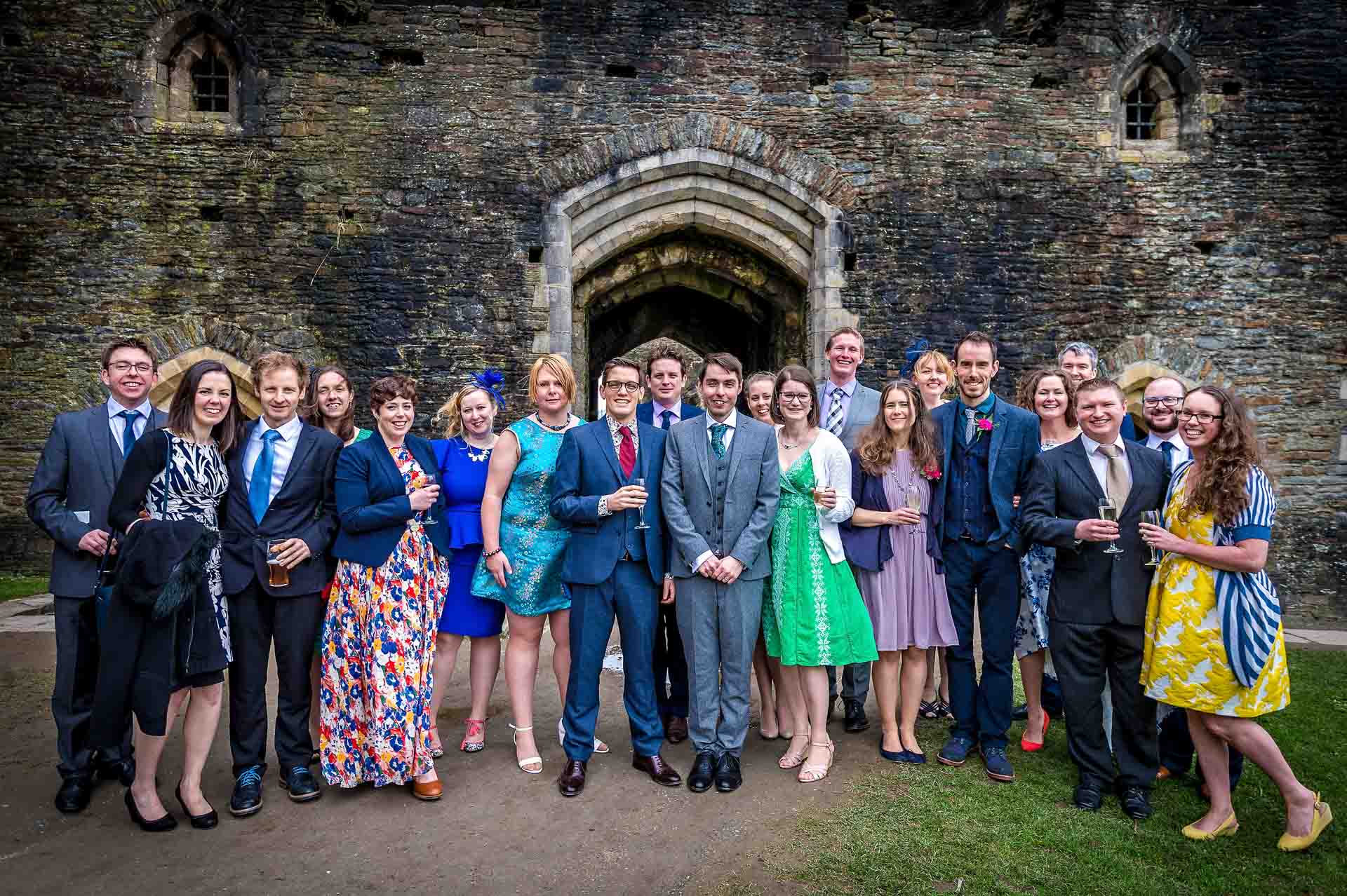 Group Wedding Photograph in the Courtyard at Caerphilly Castle