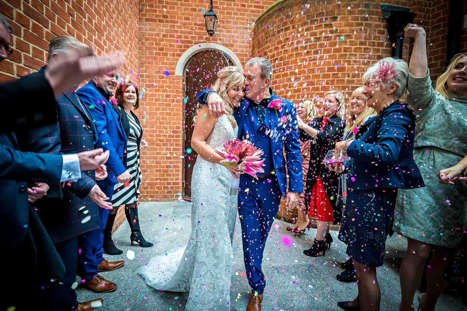 Wedding confetti at short wedding outside Fitzrovia Chapel in London