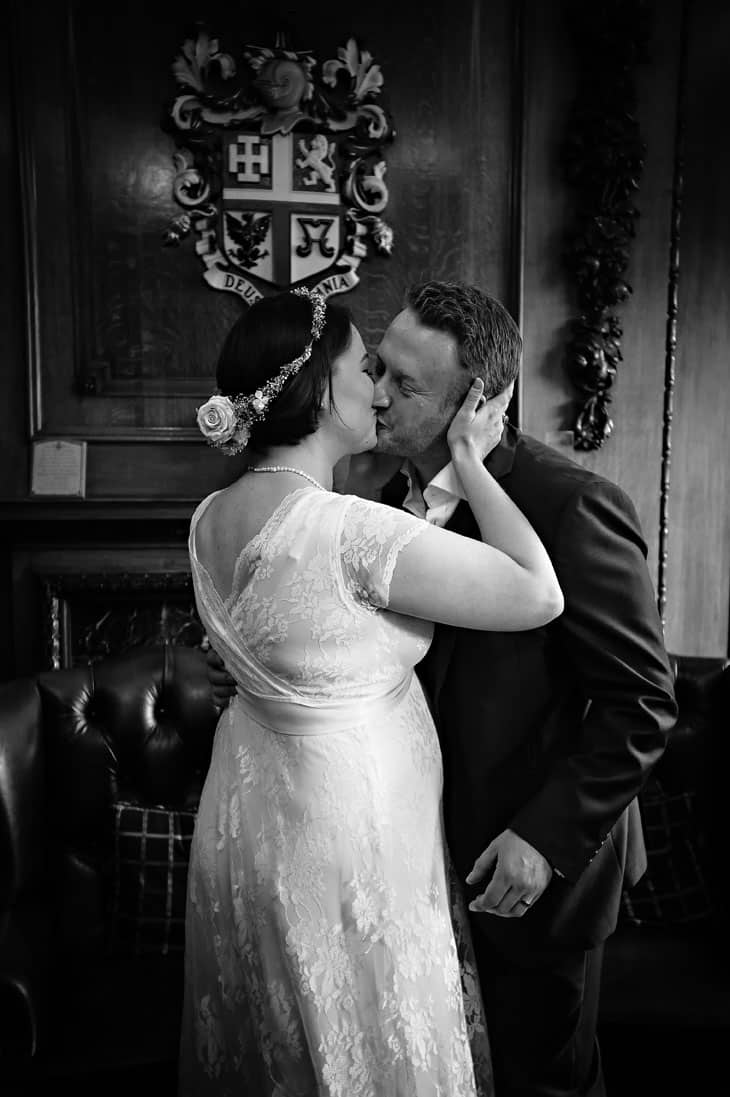 Bride and Groom Kissing First Kiss at Late Notice Wedding in Cardiff
