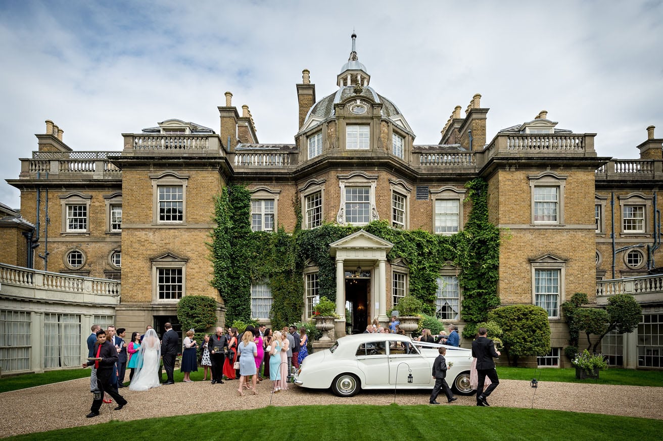 Hampton Court House - Wedding Gathering Outside with White Rolls Royce