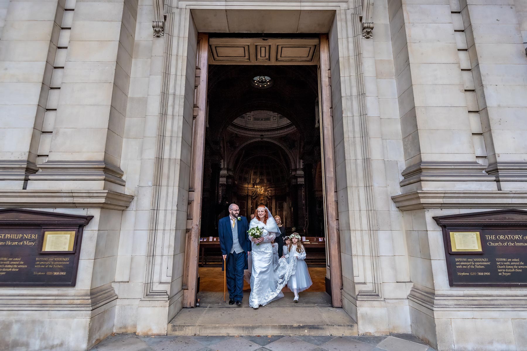 The couple and their bridesmaids exit Brompton Oratory in Knightsbridge, London
