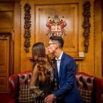 The bride and groom kiss for the first time at their wedding