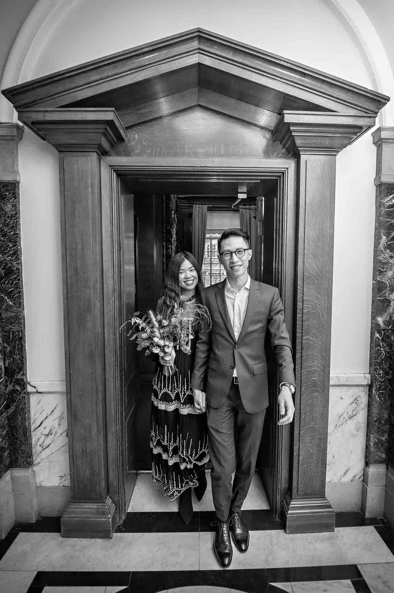 Bride and Groom leaving the Mayor's Parlour in Islington