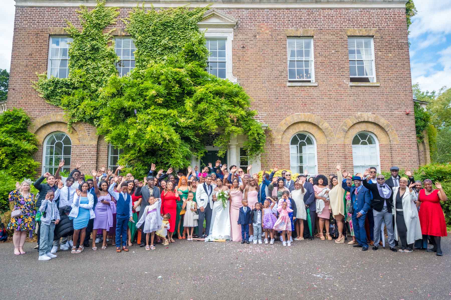 Large Group Photo Outside Morden Park House with veryone waving