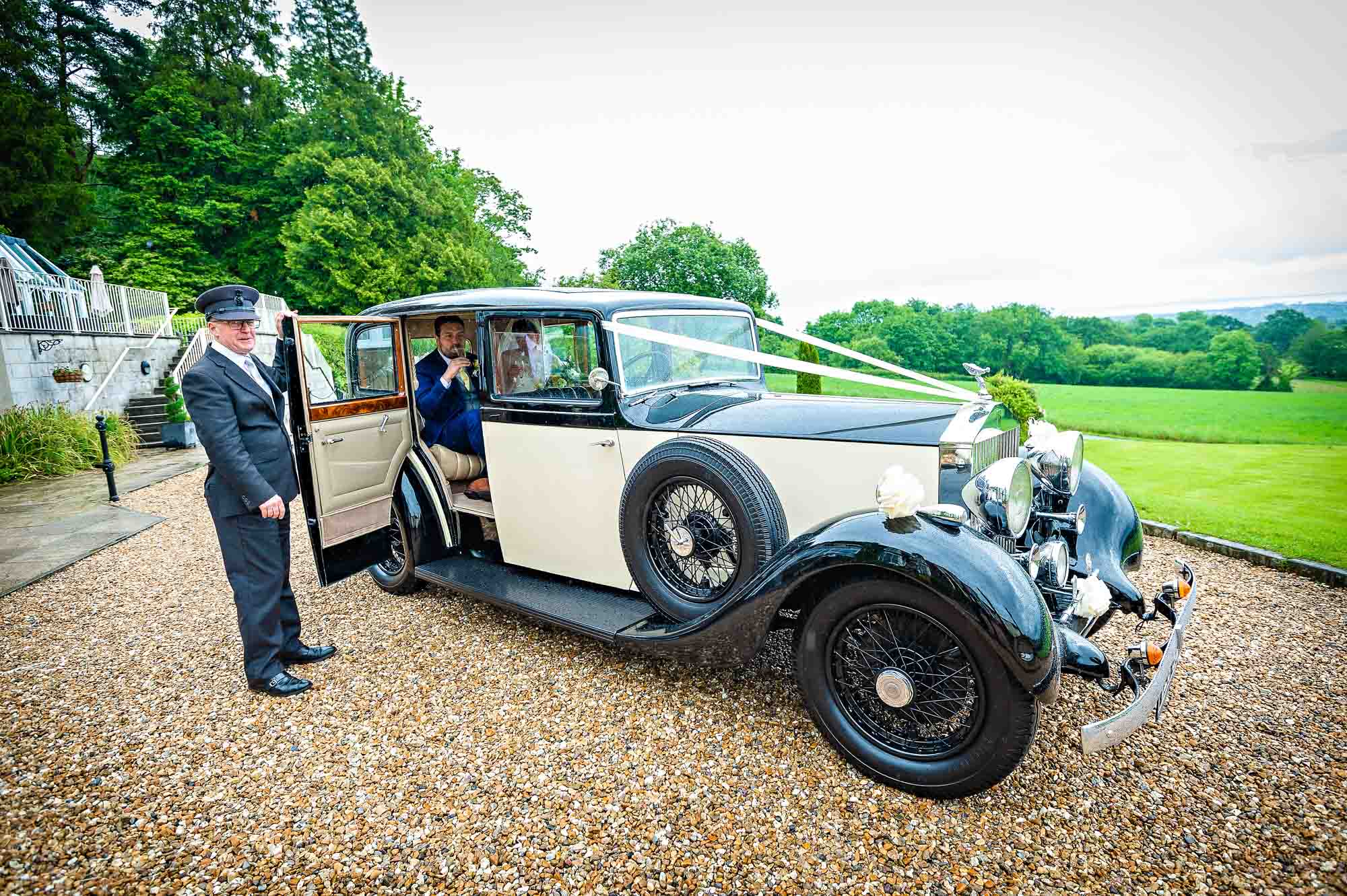 The newly-weds arrive by Rolls Royce at the New House Country Hotel in South Wales