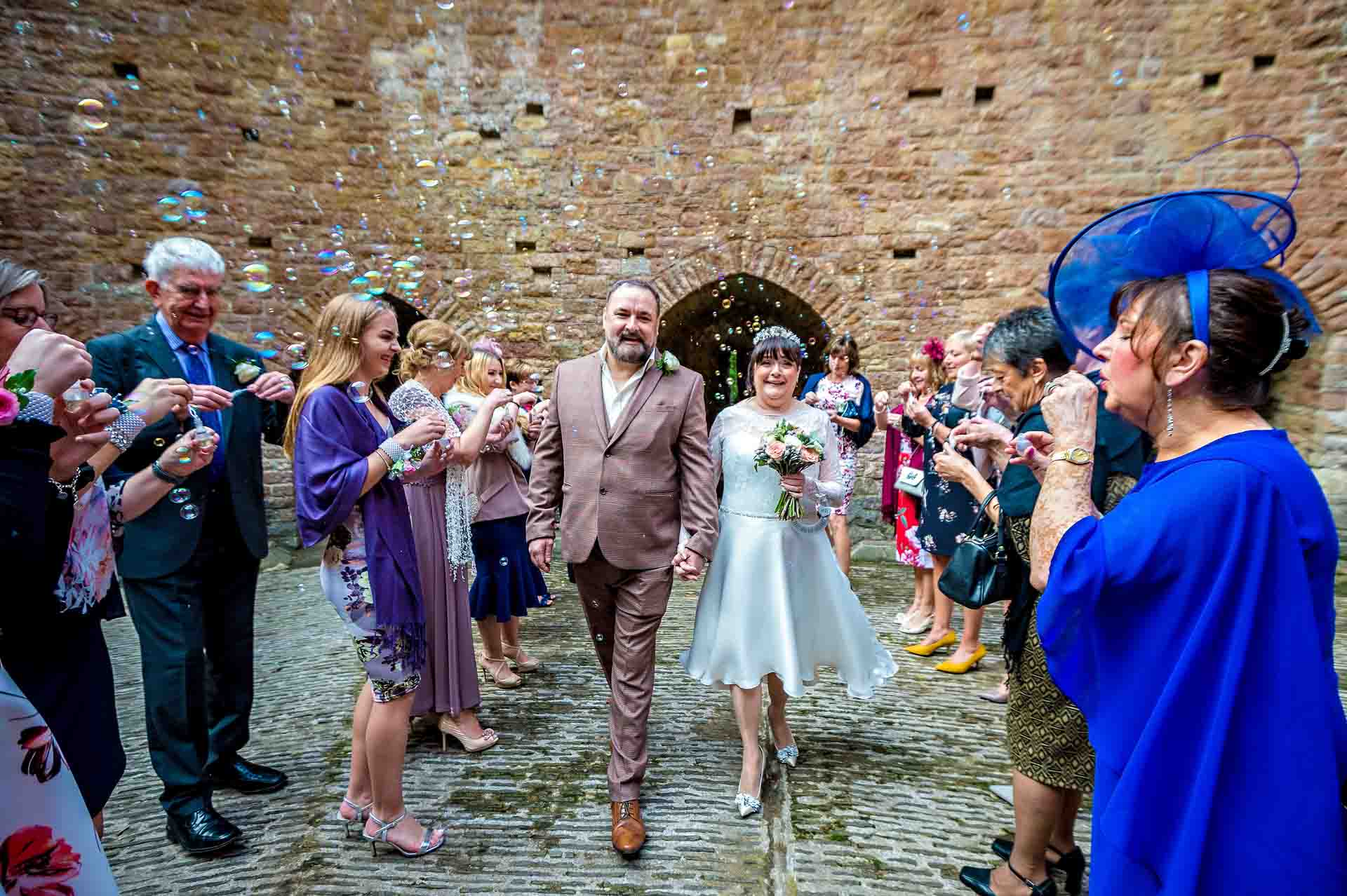Guests Blowing Bubbles at Castle Coch Wedding
