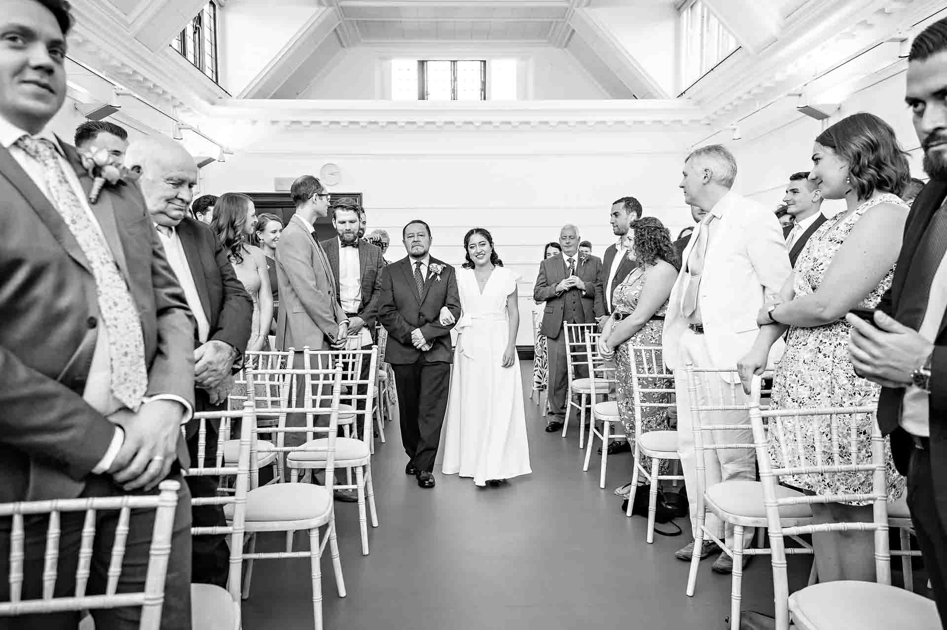 Bride and Father walking down the aisle at Fulham Library