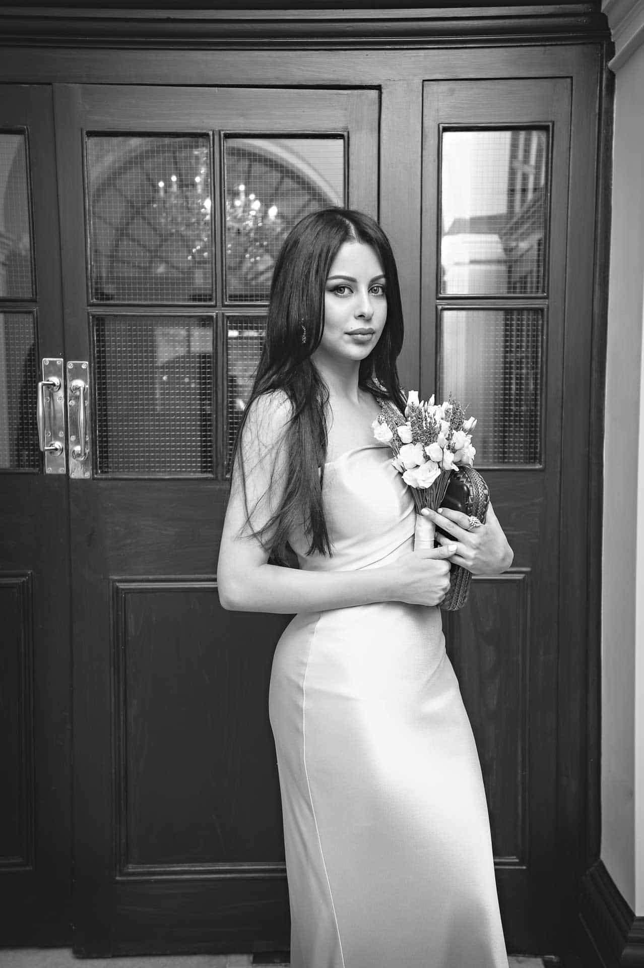 Young Female Wedding Guest in Hall of Chelsea Old Town Hall