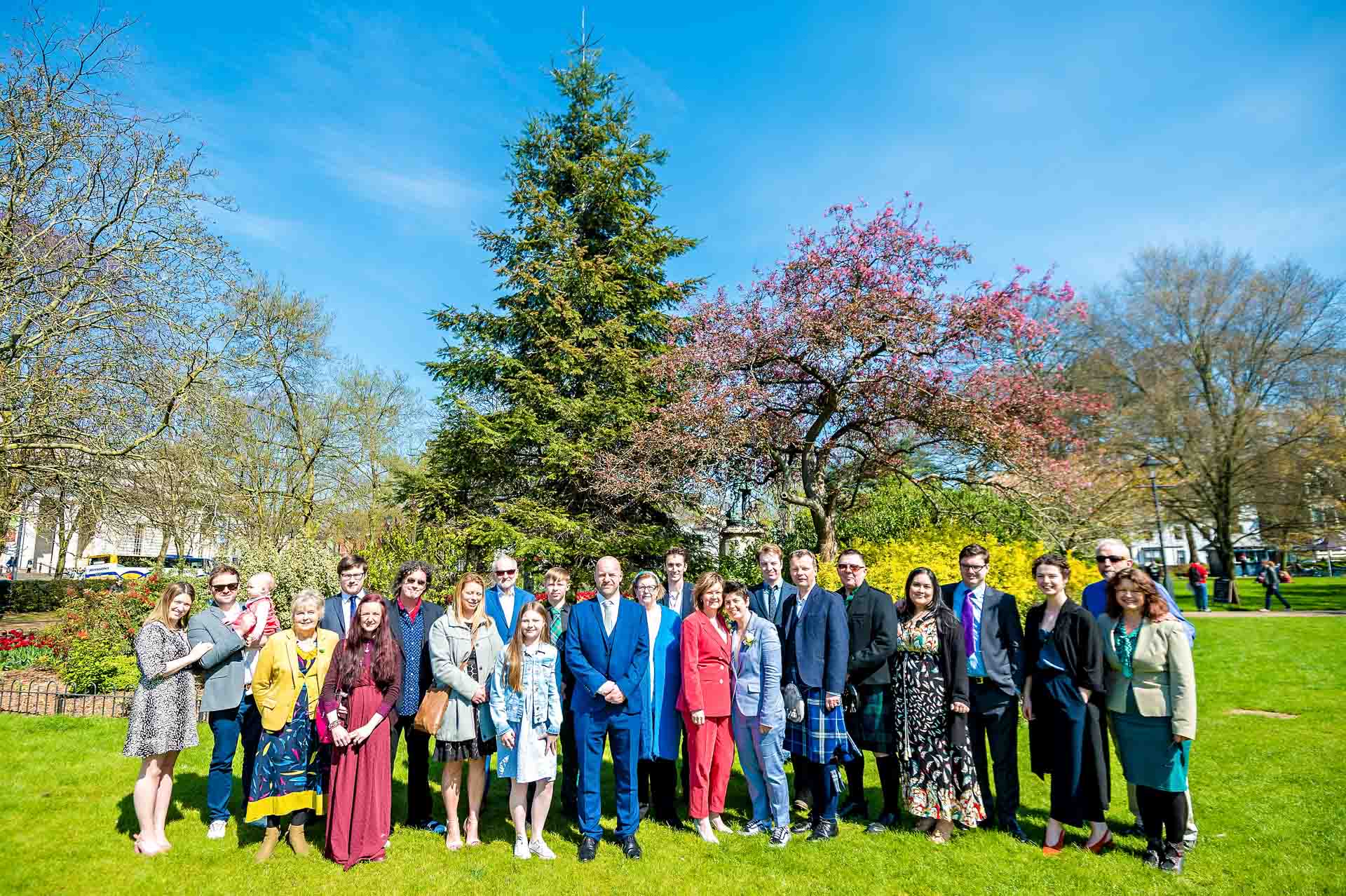 Group Family Wedding Photo on Lawn Outside Cardiff City Hall